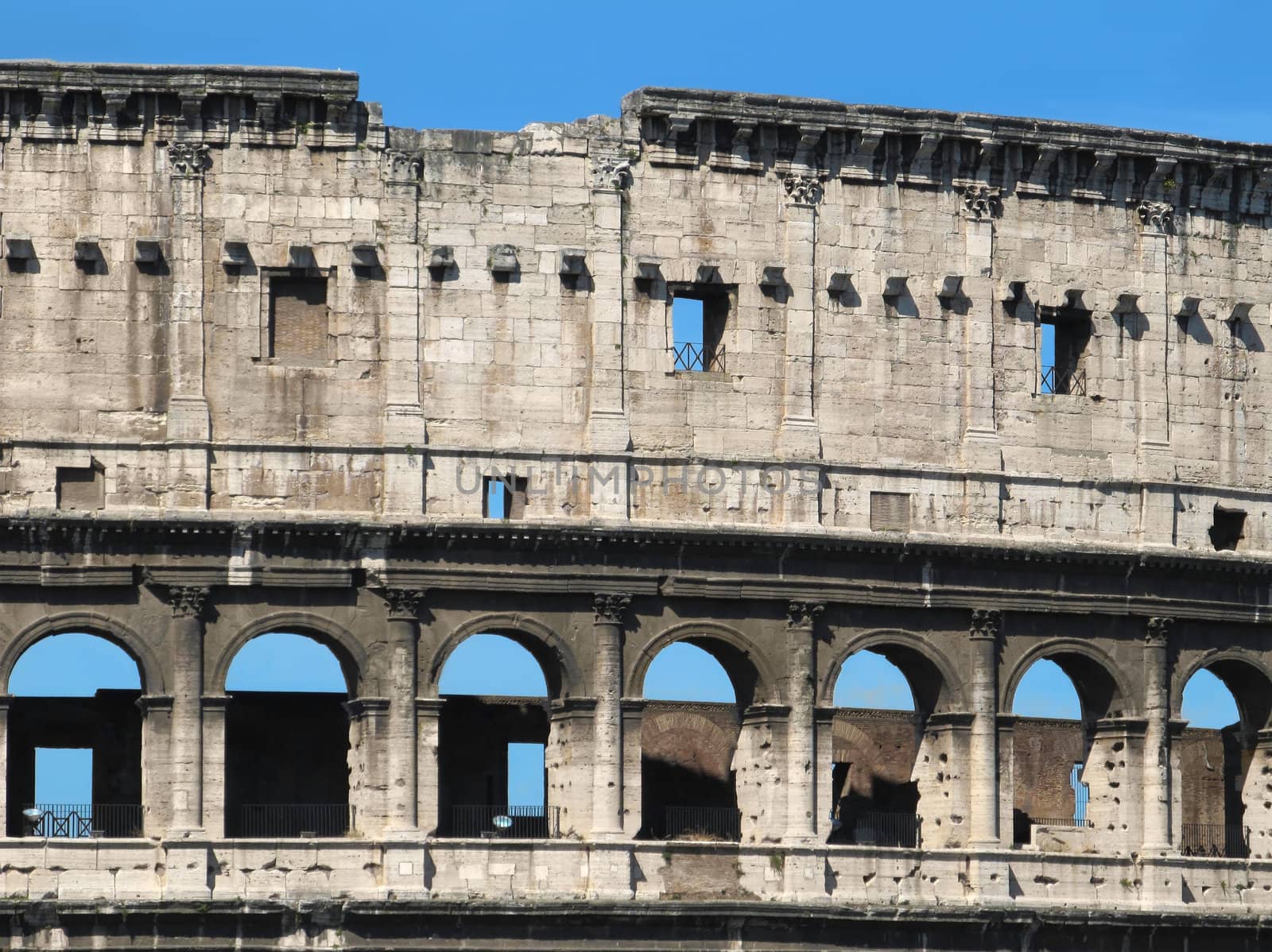 Detail of the famous landmark - The Colosseum in Rome, Italy.