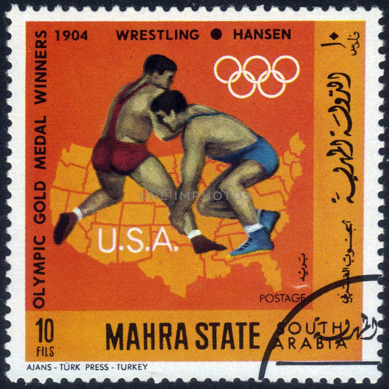 South Arabia - CIRCA 1968: A stamp printed in Mahra State of South Arabia shows an image of American sportsman Hansen, the winner in wrestling in Olympic Games in St. Louis , Missouri 1904, series, circa 1968