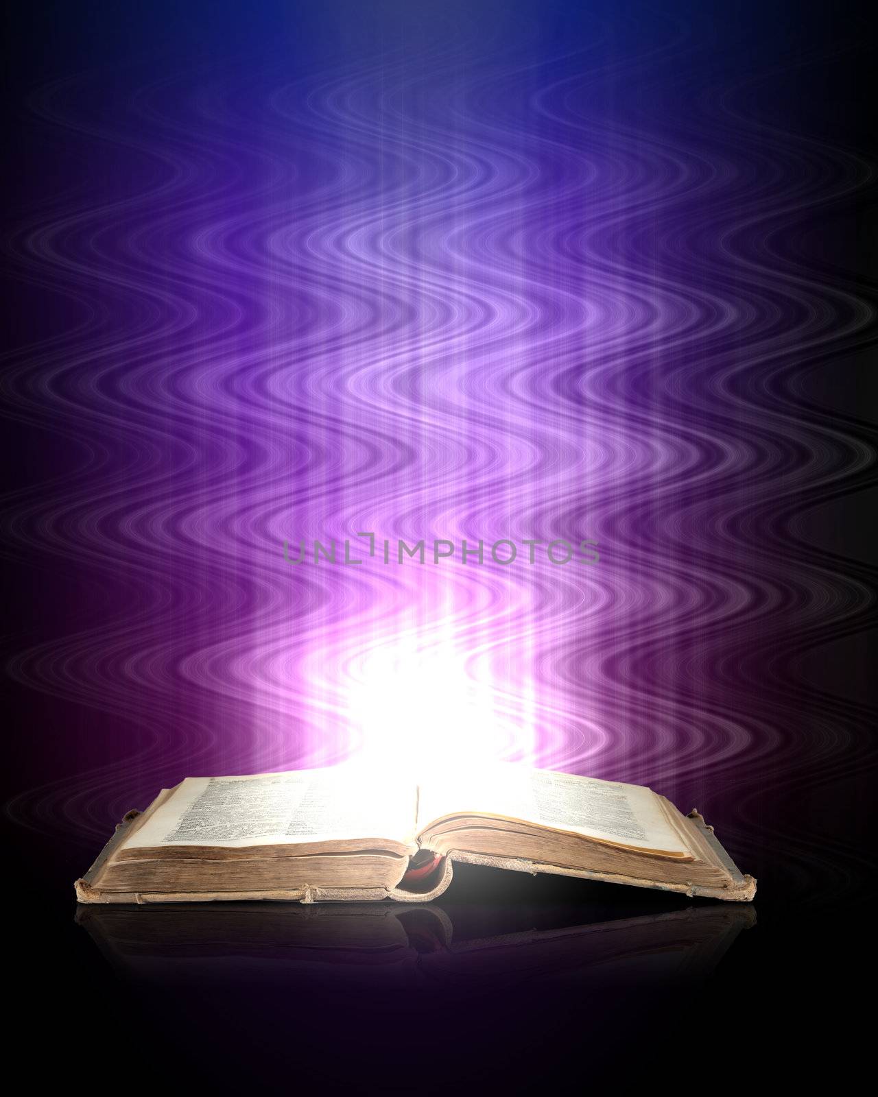 Magic book with light coming from inside it