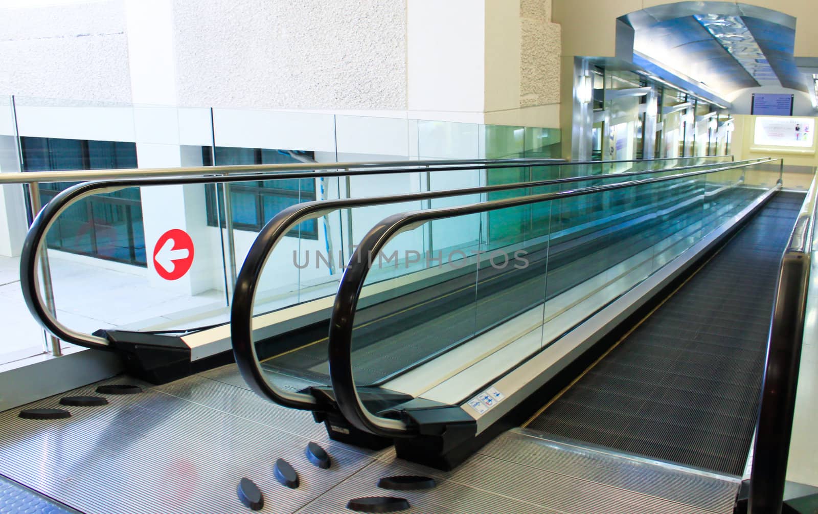 moving escalator of walkway in building