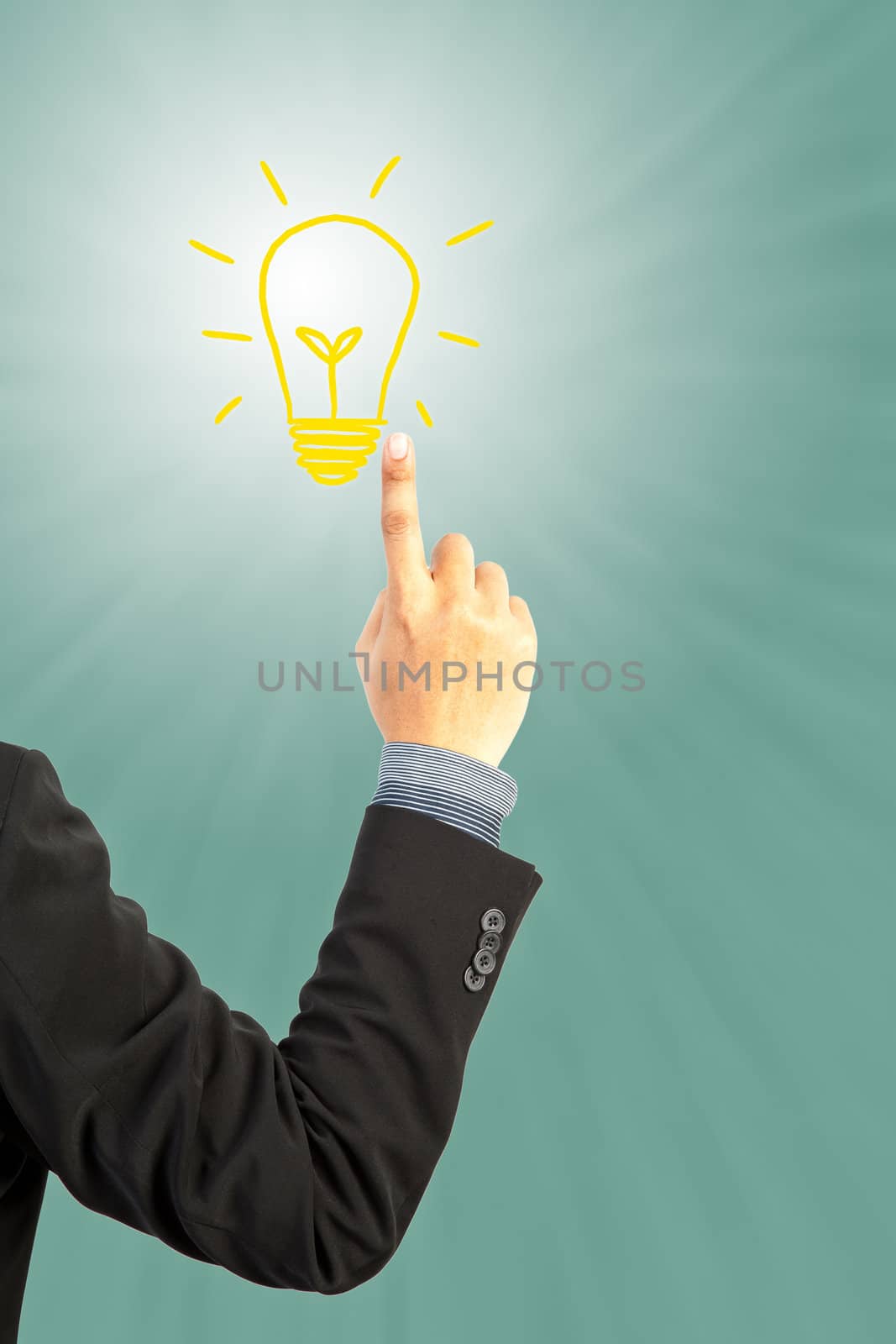 businessman hand pushing light bulb idea