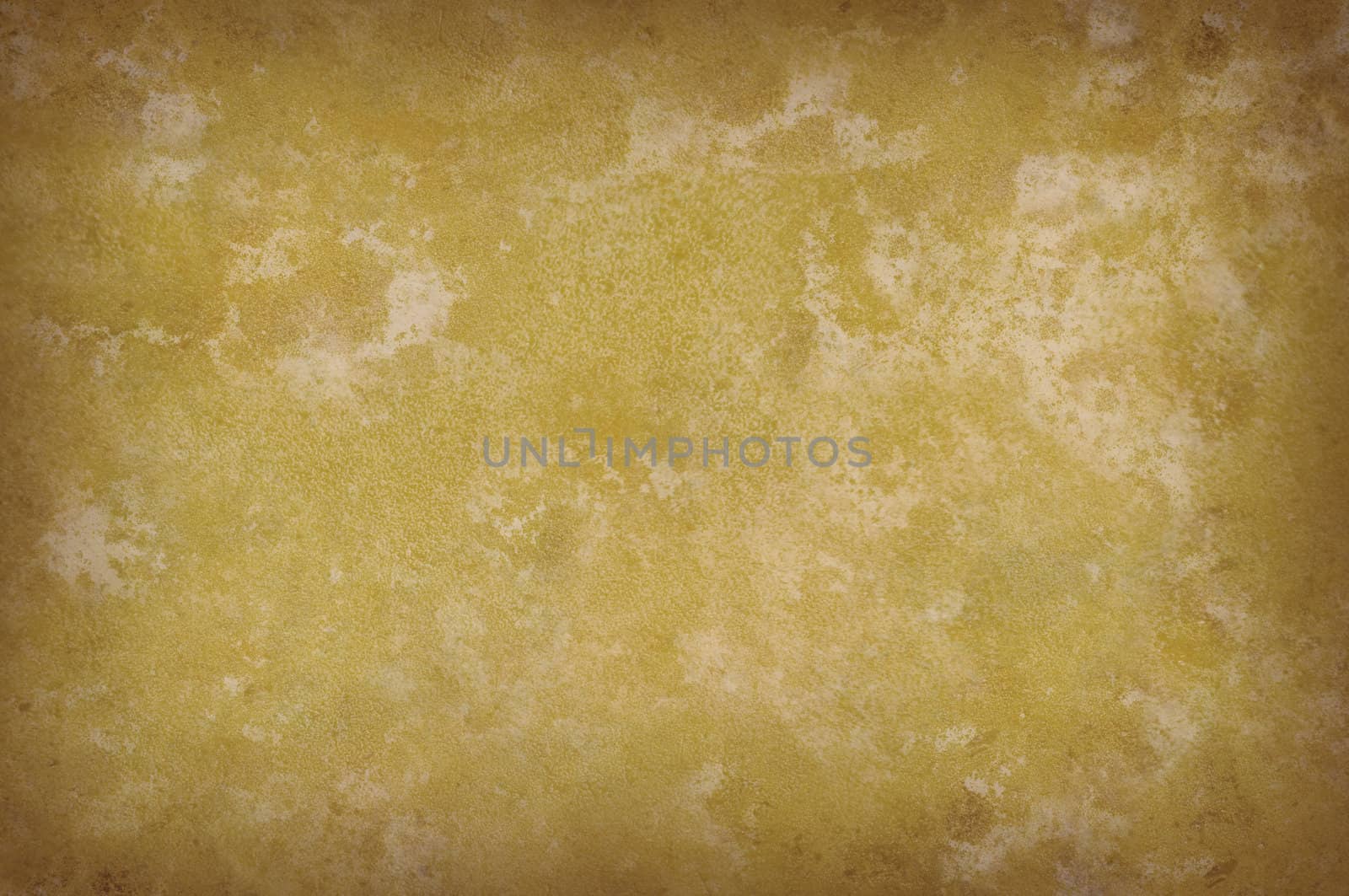 Grungy yellowish mottled background surface texture