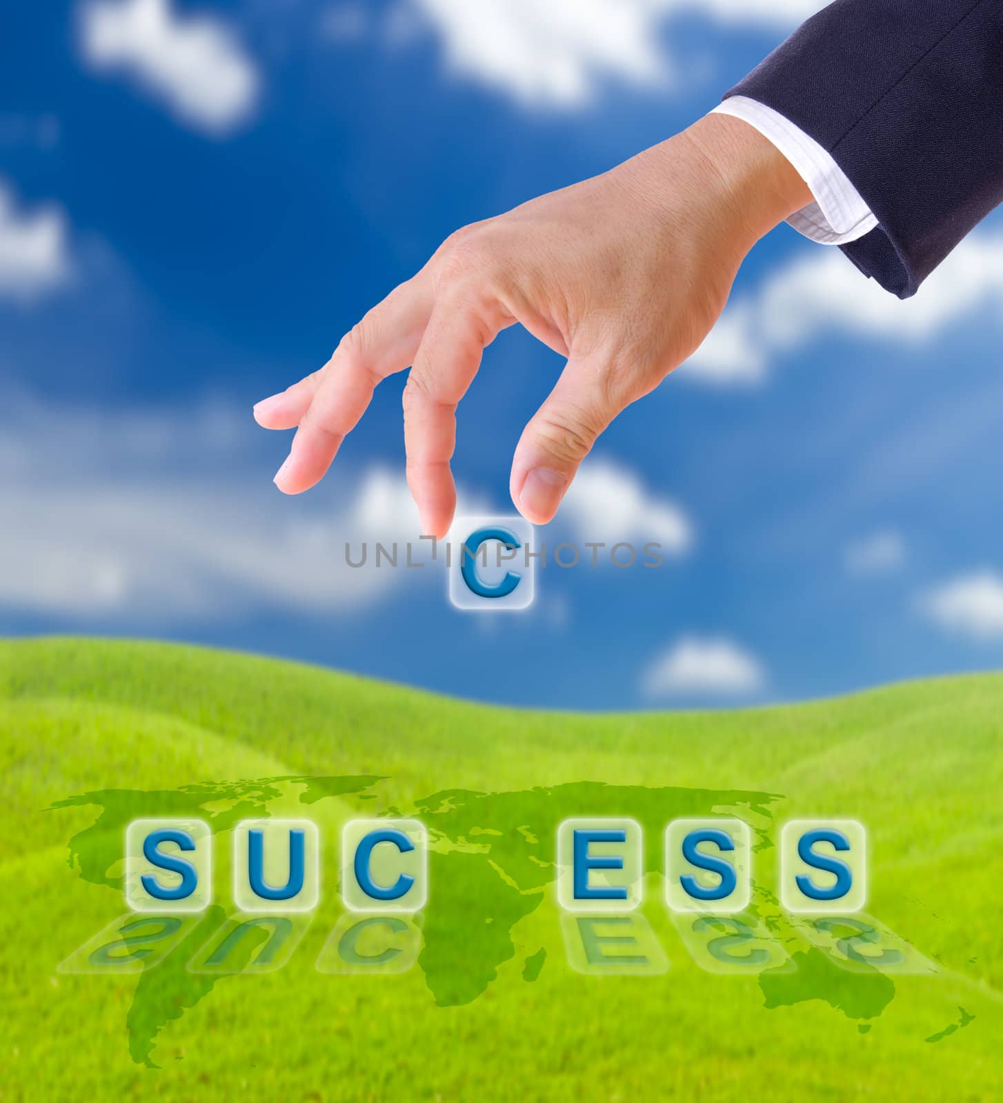 hand puting letter c to  success word by tungphoto