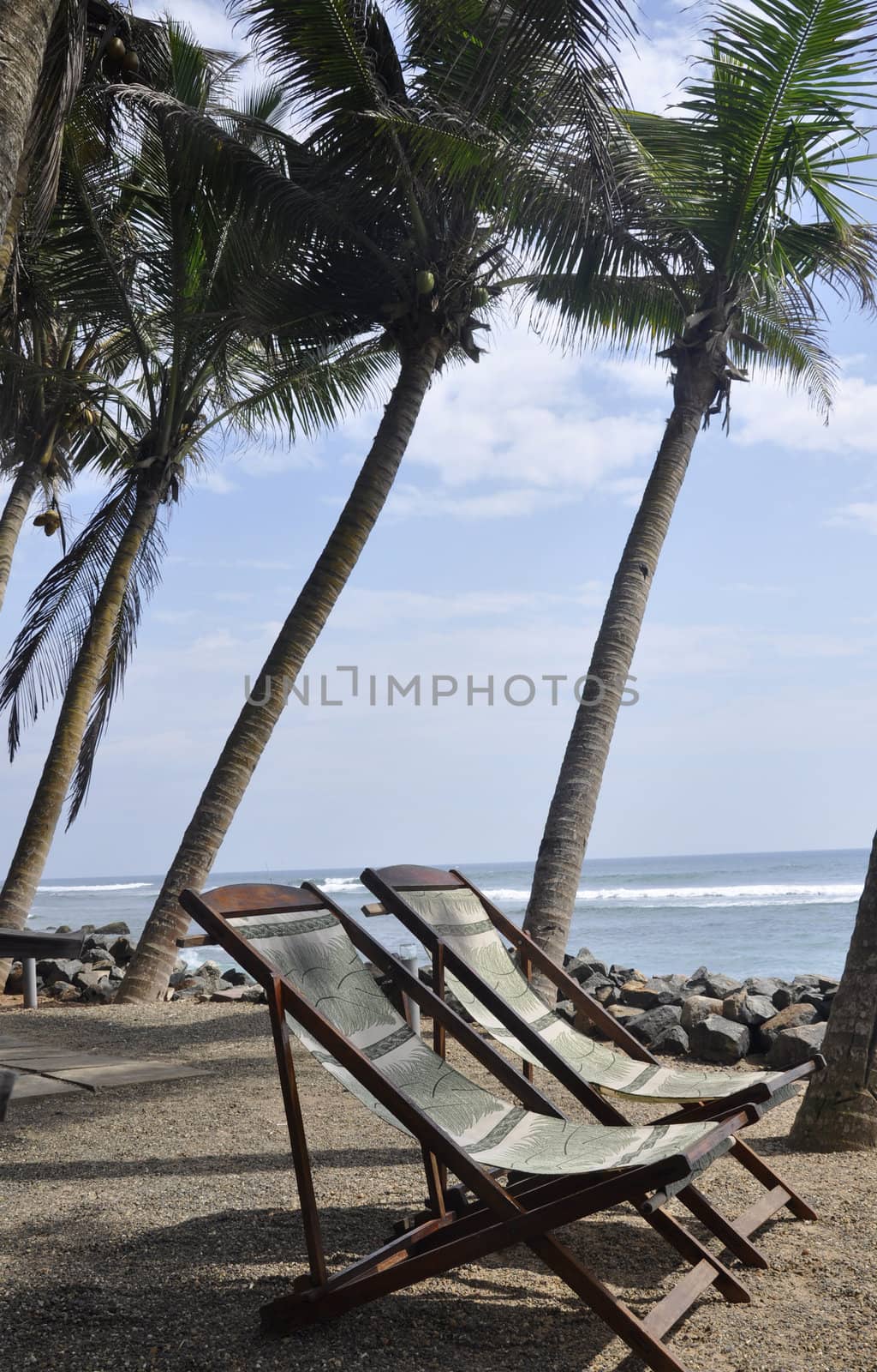 Two beach chairs with a beautiful view at Polhena, Sri Lanka