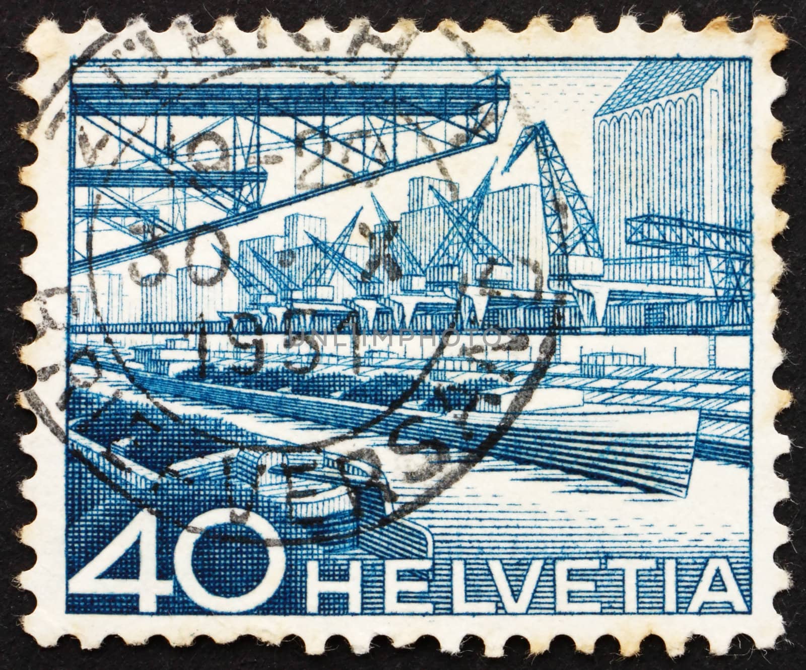 SWITZERLAND - CIRCA 1949: a stamp printed in the Switzerland shows Harbor of the Rhine, circa 1949