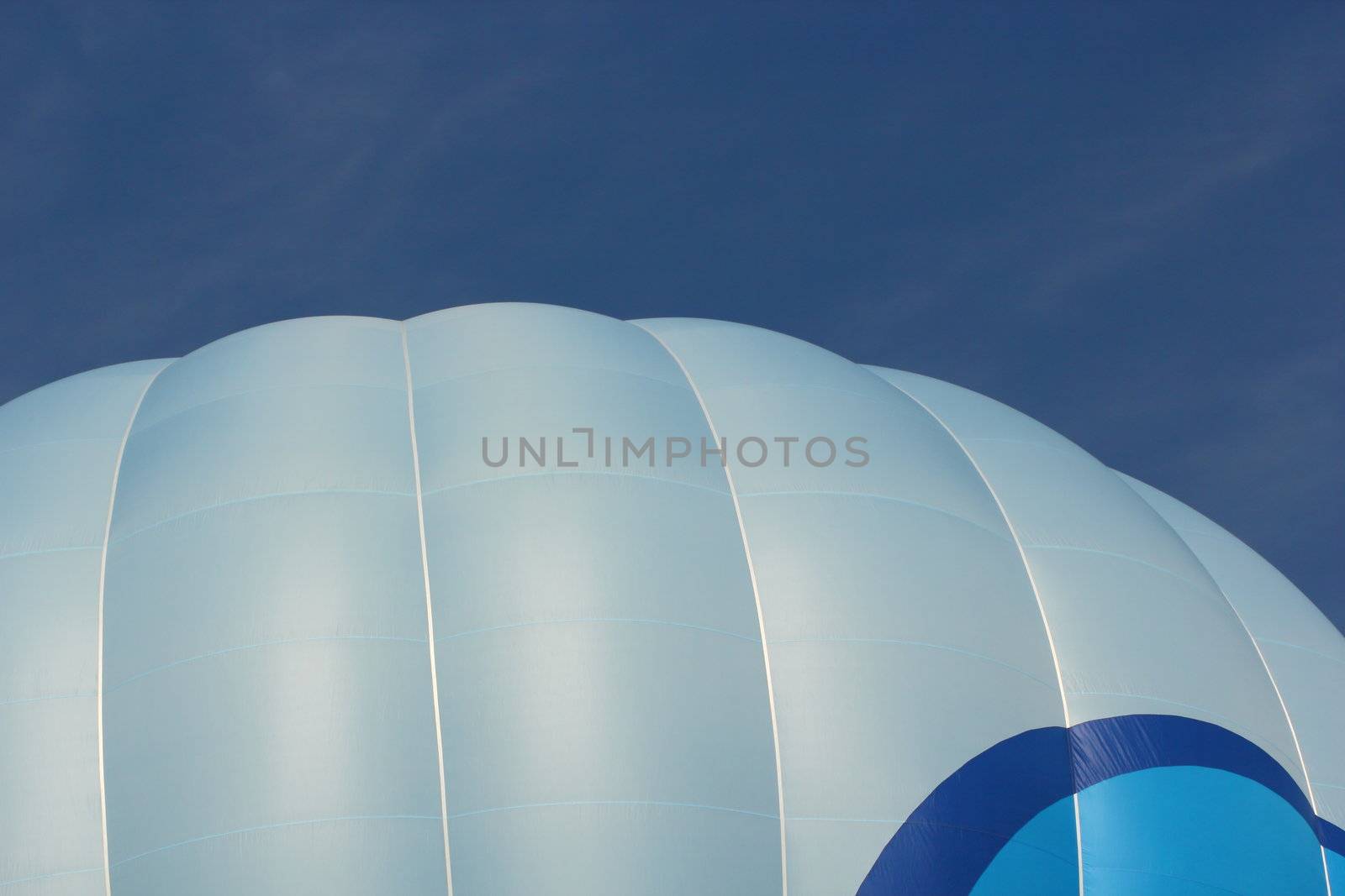 top of hot air balloon over blue sky