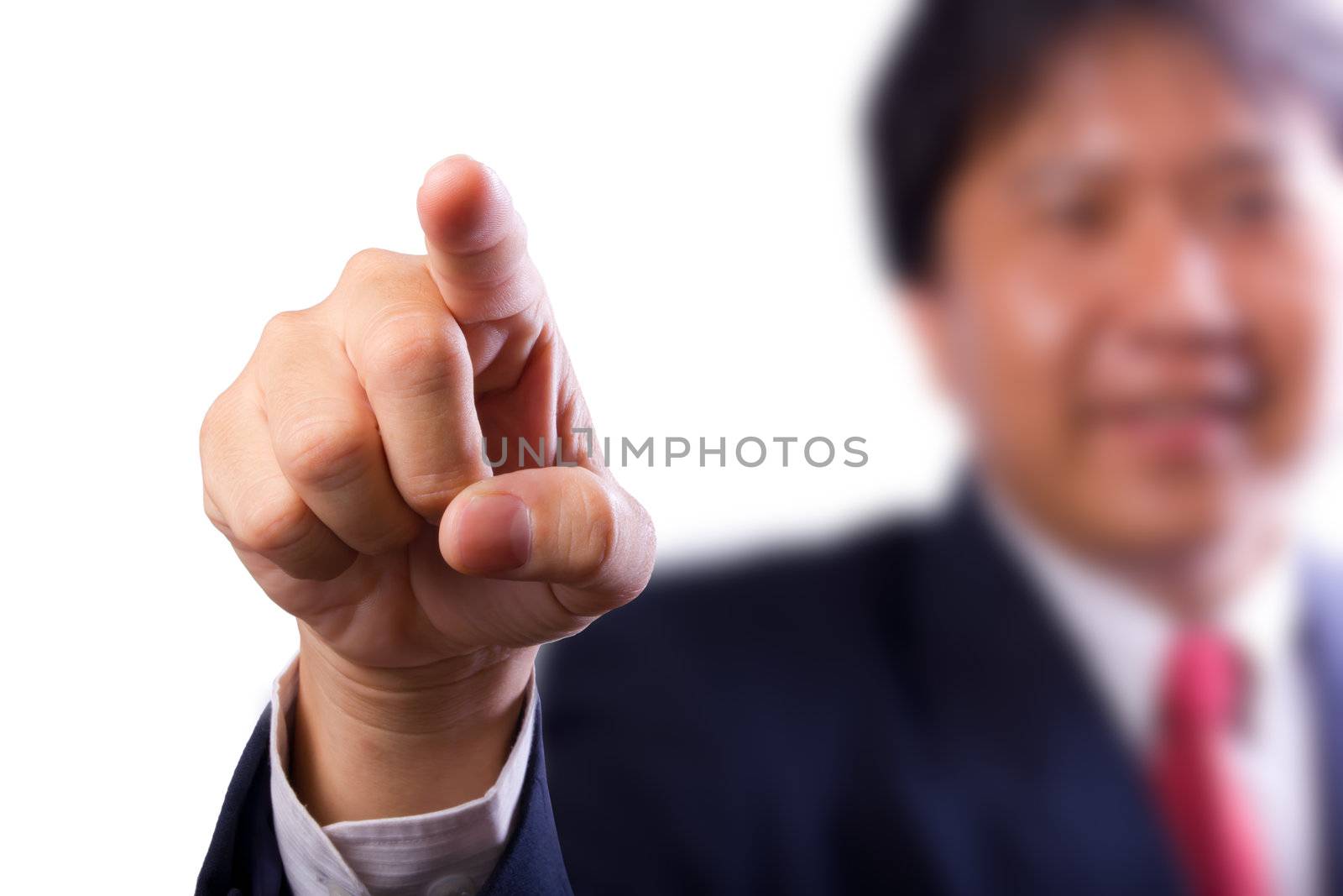 business man pointing finger by tungphoto