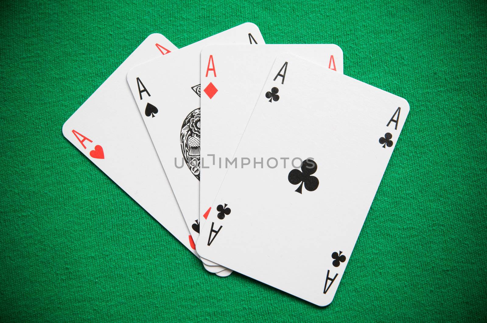 

A Colourful Photo of a Hand of Aces