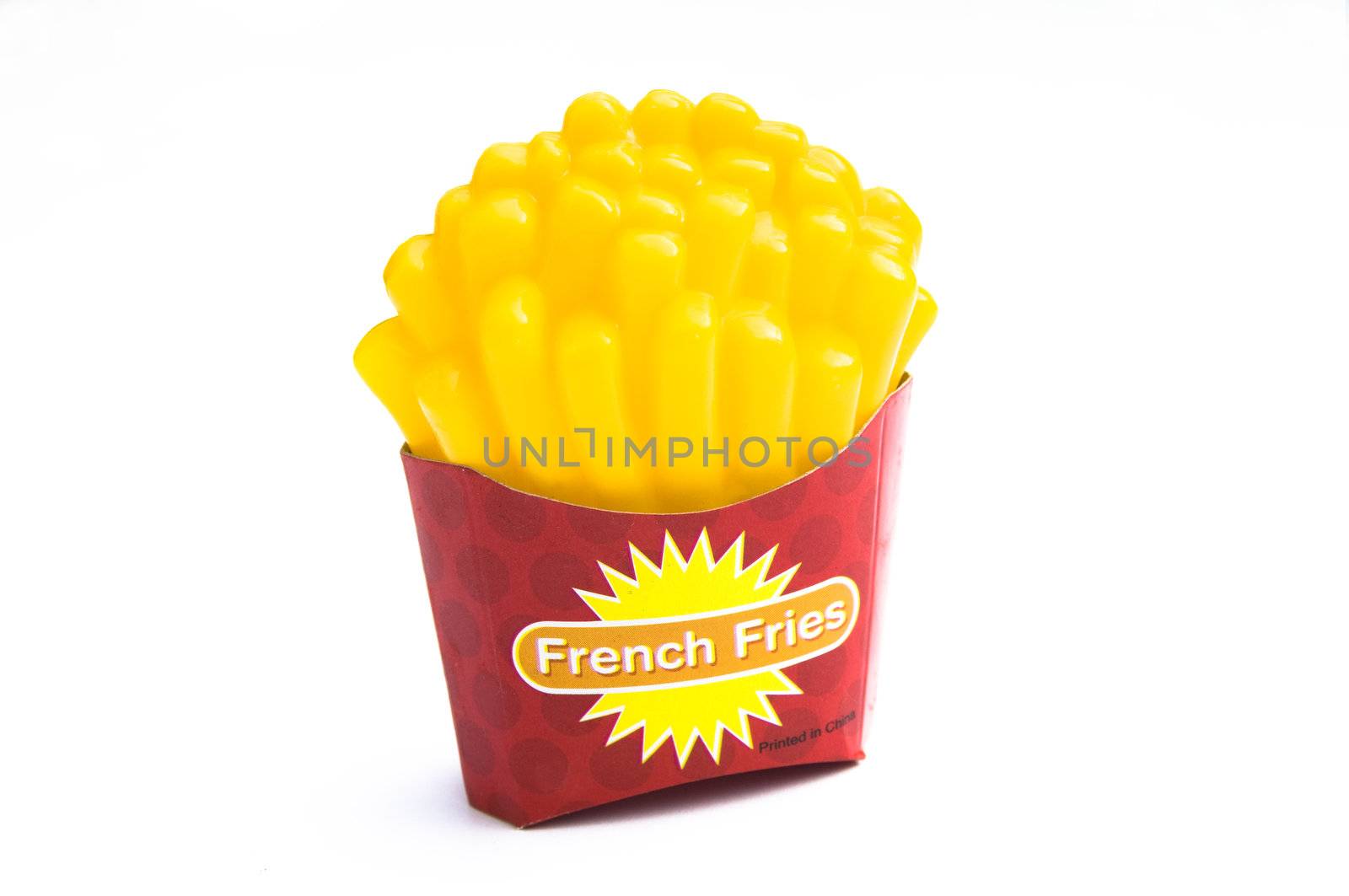 A Colouful Isolated photo of a Childs French Fries toy, highlighting increasing obesity in children