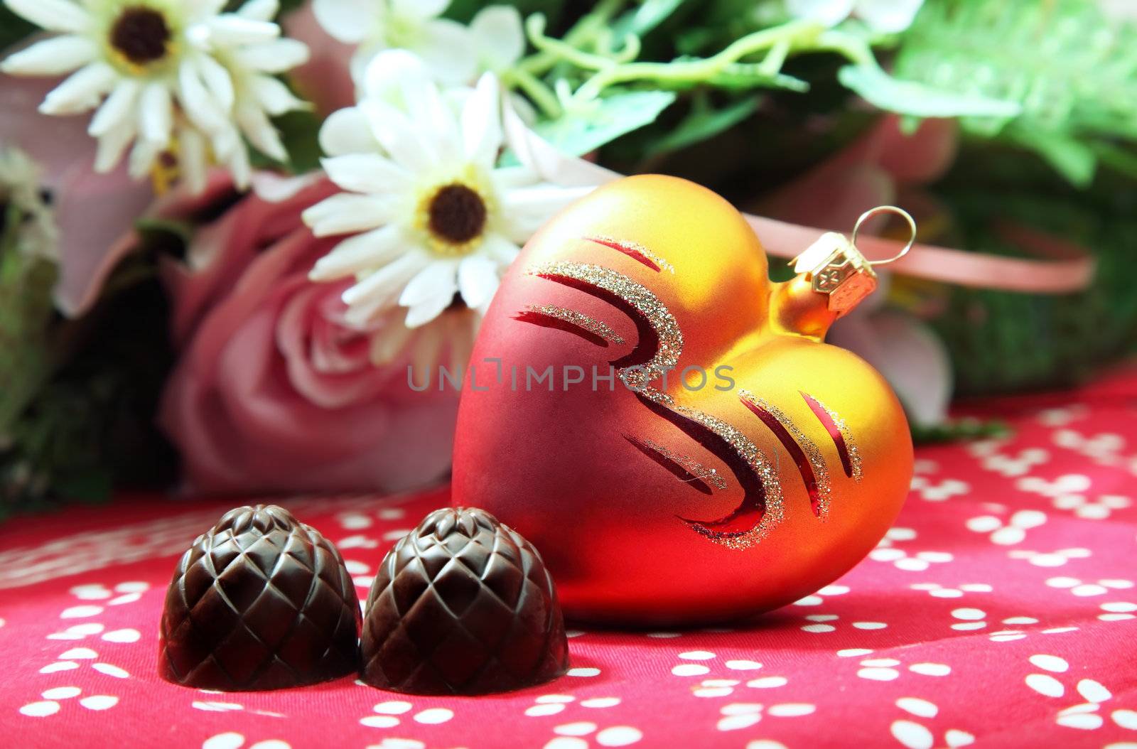 Chocolate sweets hearts and flowers as a symbol of Valentine's Day
