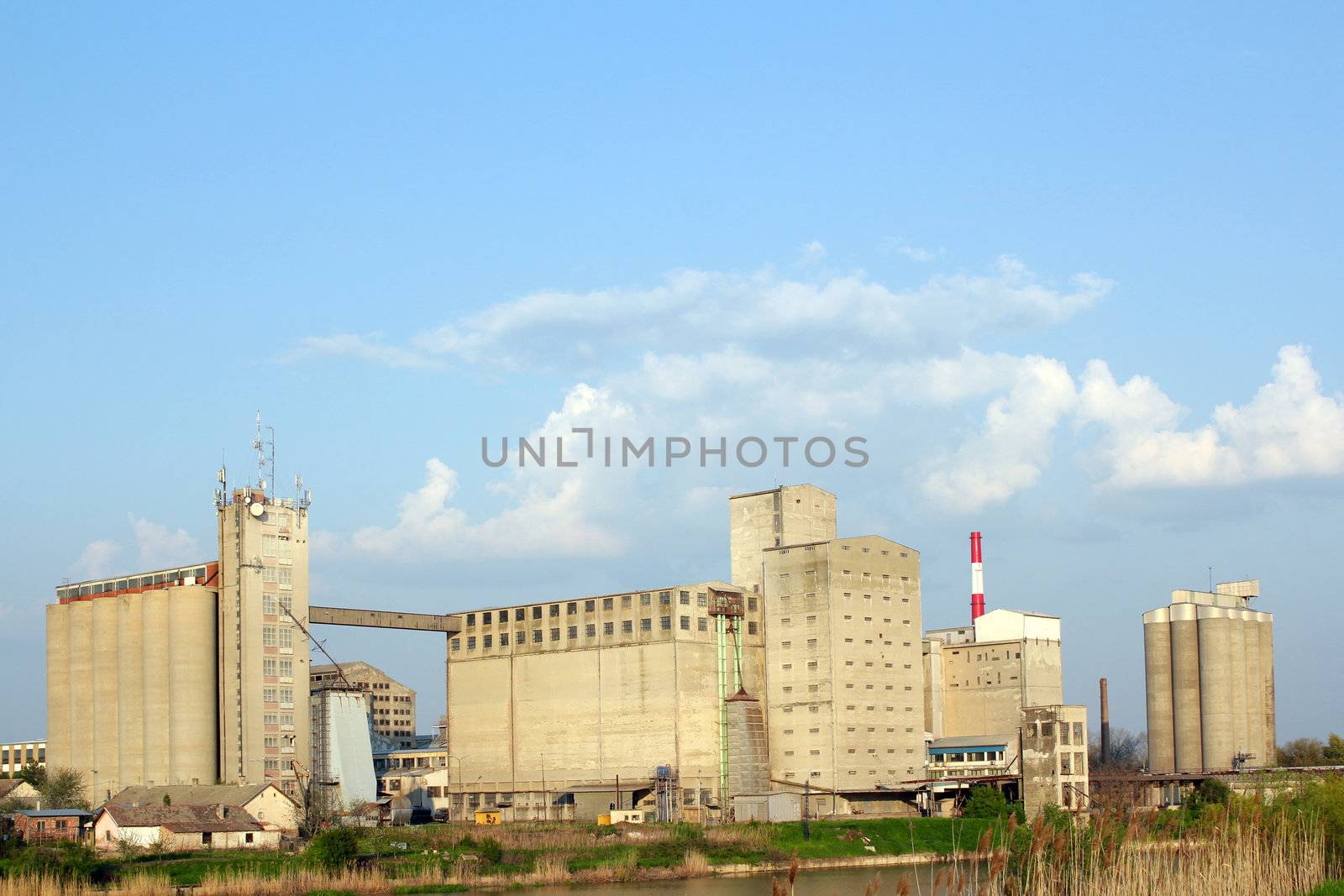 industry zone with silo and warehouse