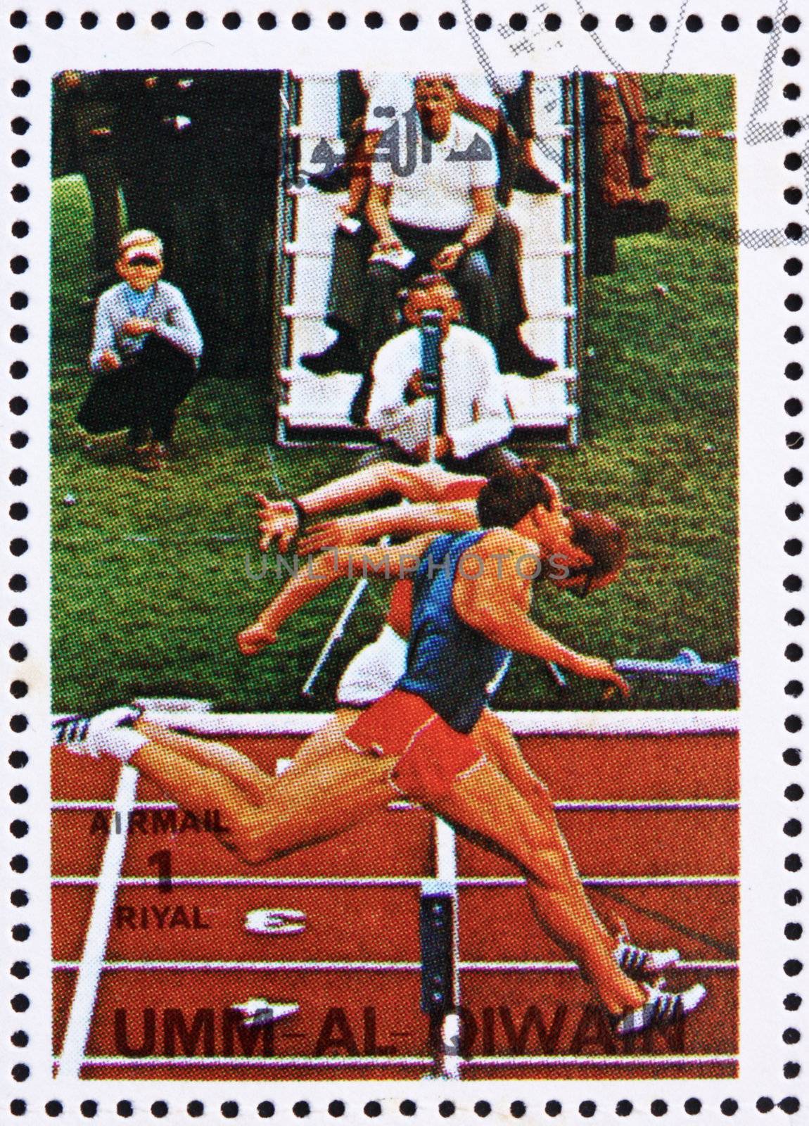 UMM AL-QUWAIN - CIRCA 1972: a stamp printed in the Umm al-Quwain shows Sprint, Olympic Sport, Olympic Games of the past, circa 1972