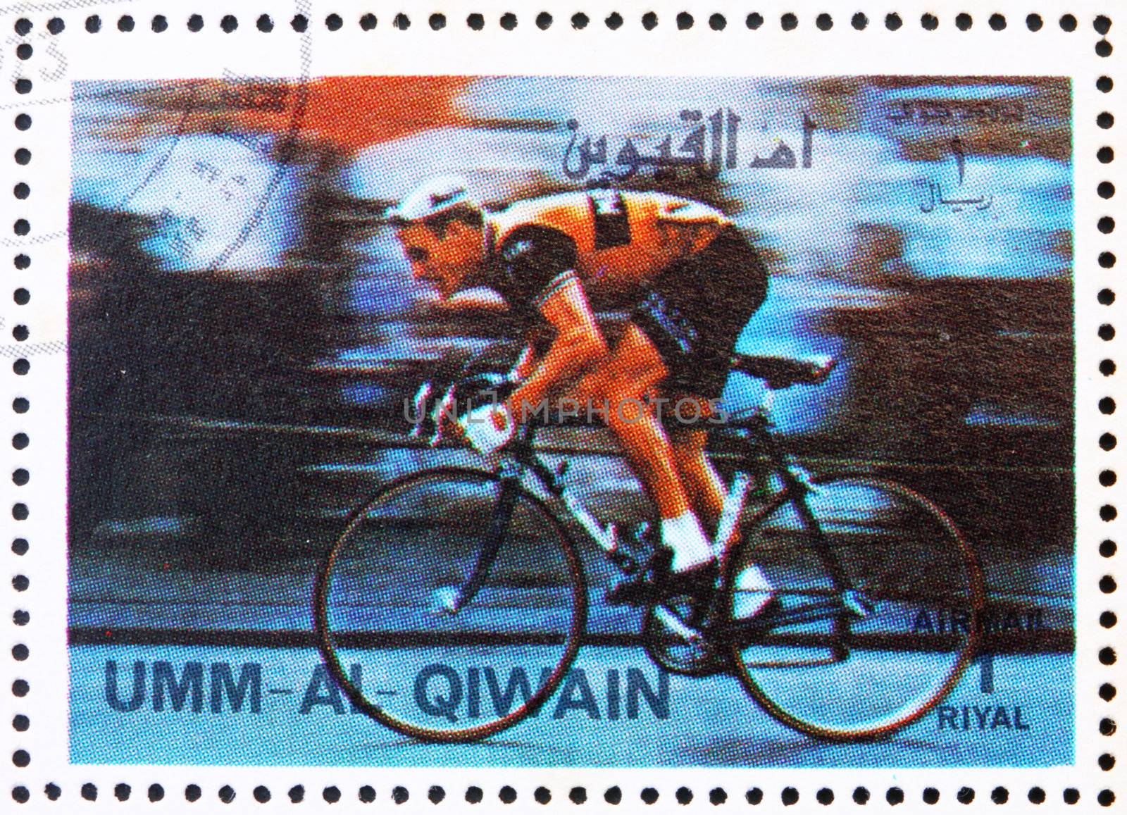 UMM AL-QUWAIN - CIRCA 1972: a stamp printed in the Umm al-Quwain shows Cycling, Olympic Sport, Olympic Games of the past, circa 1972