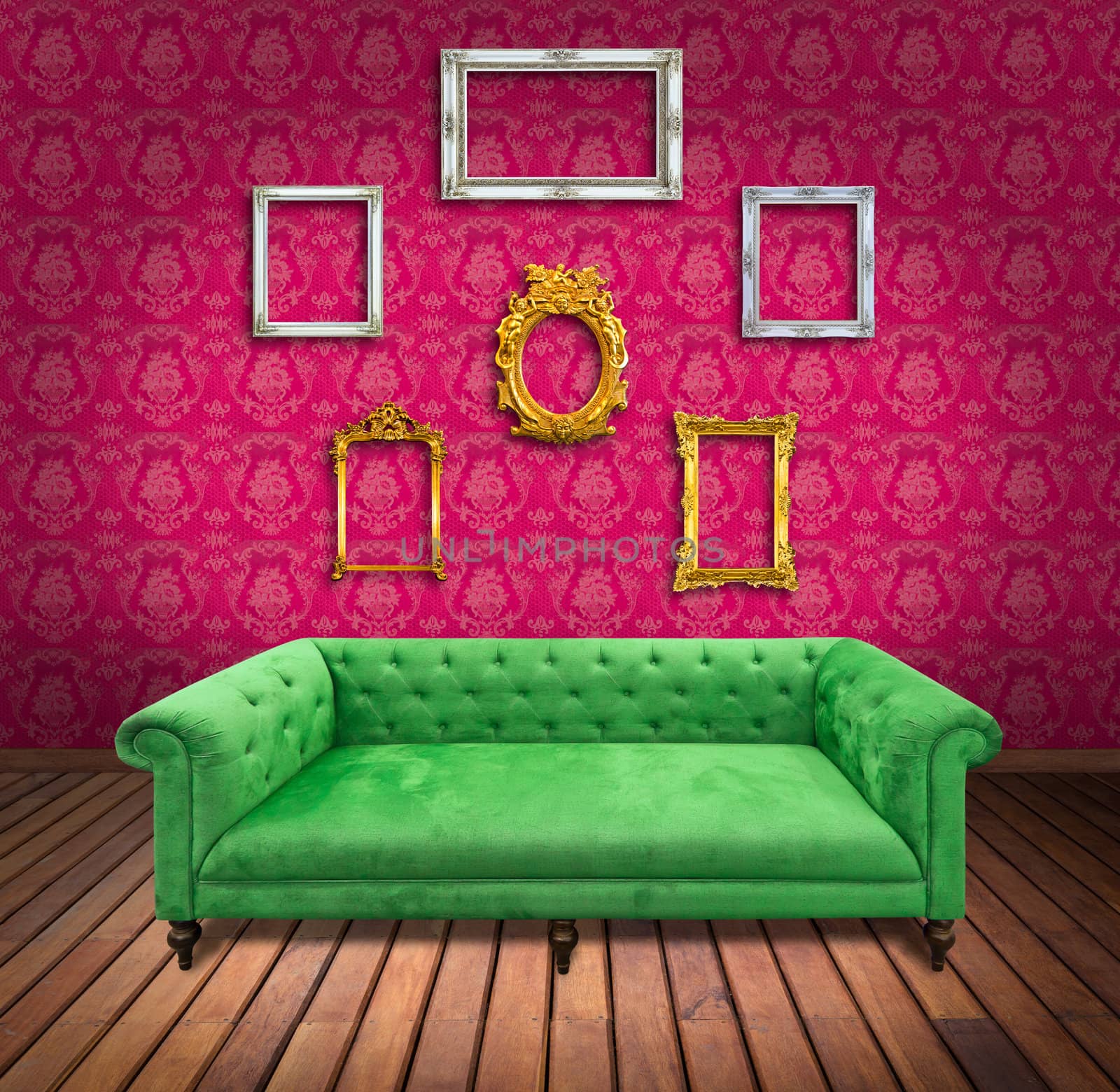 Sofa and frame in pink wallpaper room by tungphoto