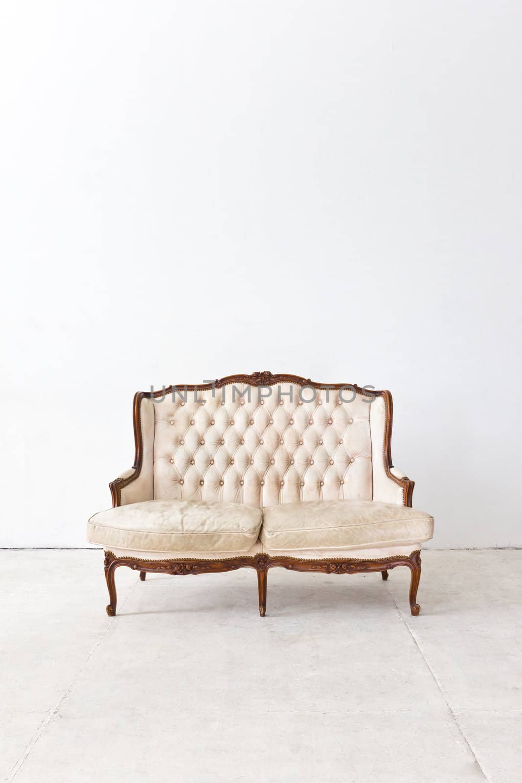 vintage luxury armchair in white room