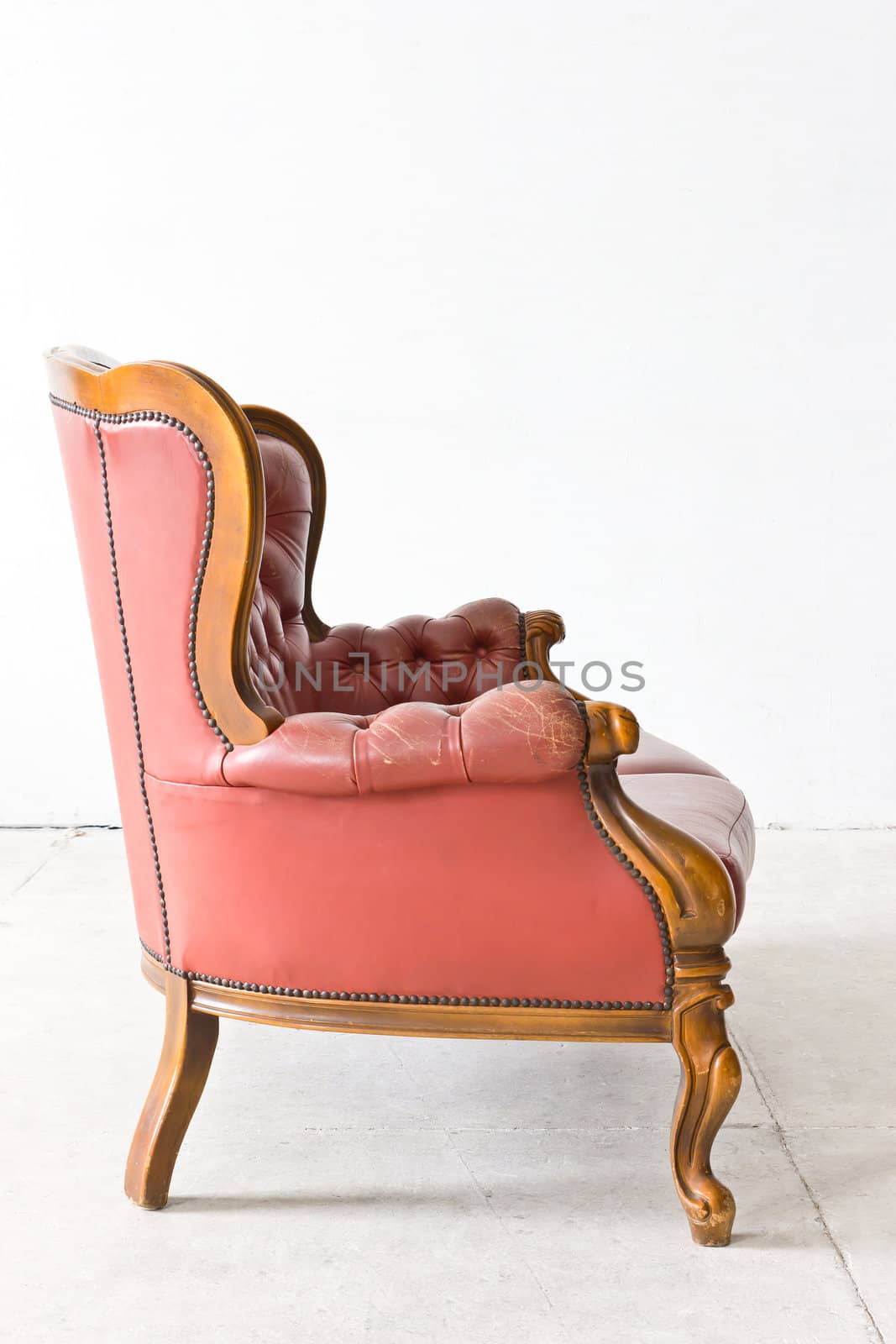 vintage luxury armchair in white room  by tungphoto