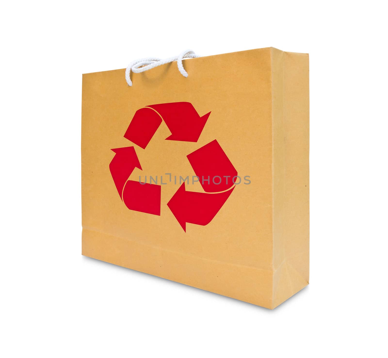 recycle sign on brown paper bag by tungphoto