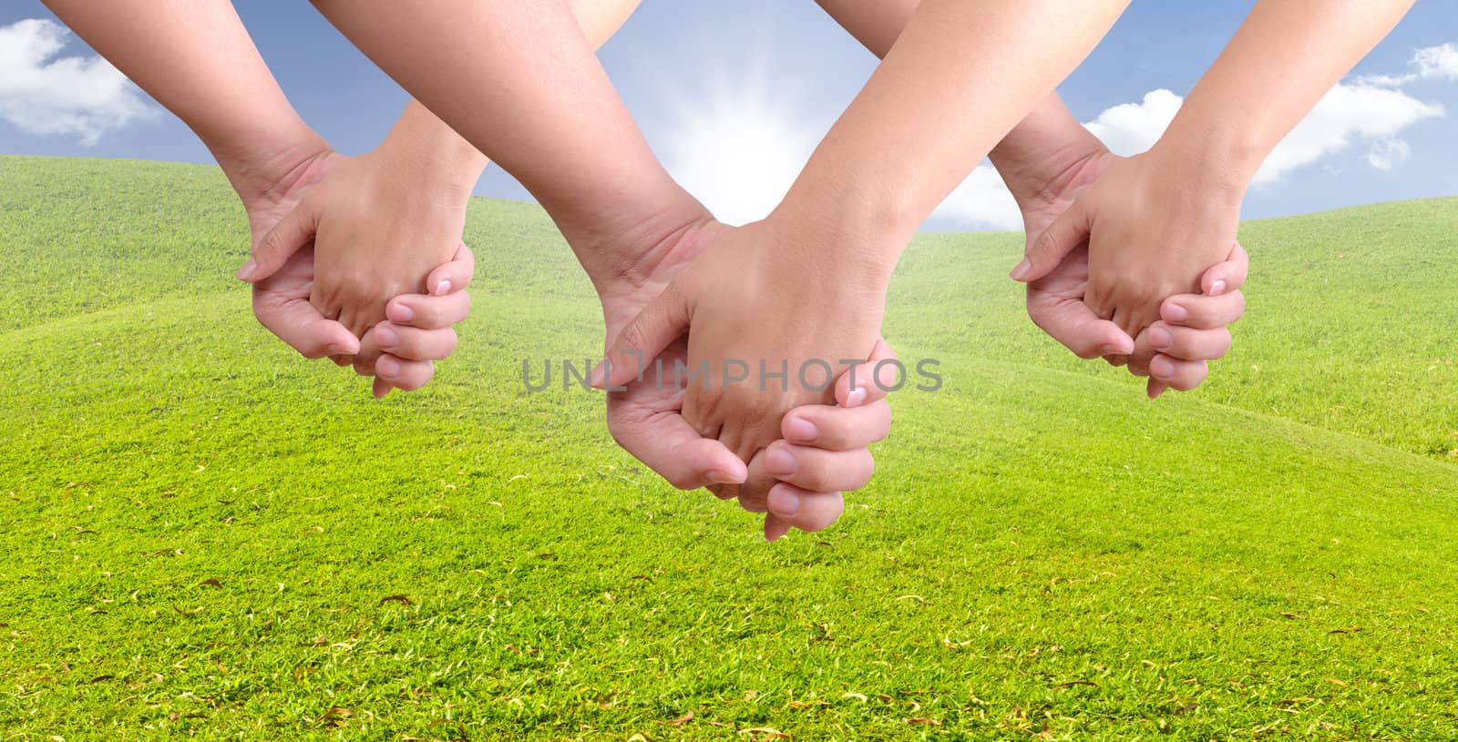 man holding woman hand by tungphoto