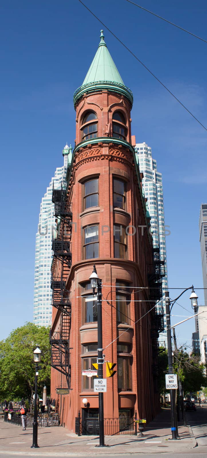The red-brick Gooderham Building (commonly referred to as the "Flatiron Building") is a historic landmark of Toronto, Ontario, Canada located at 49 Wellington Street East.