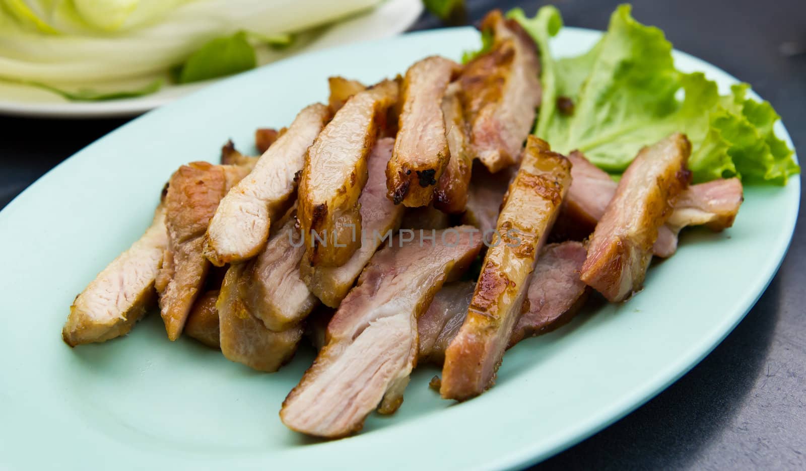 fired neck on pork  by tungphoto