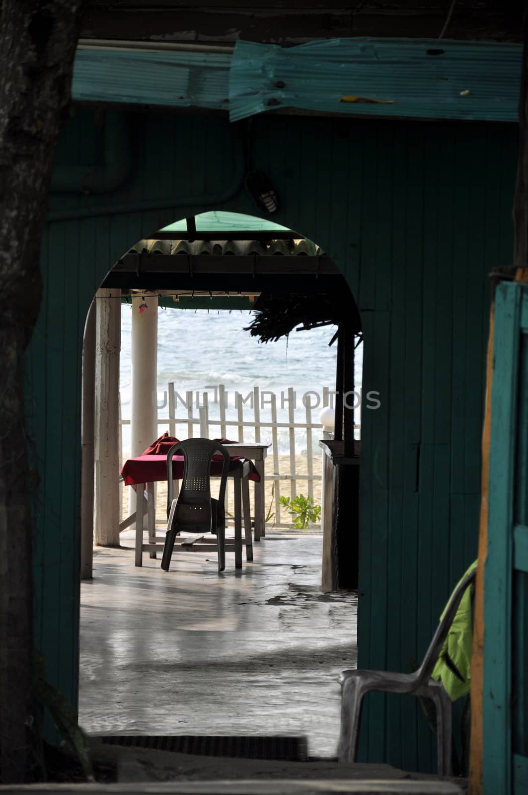 The view of the ocean through a shack at the beach by kdreams02