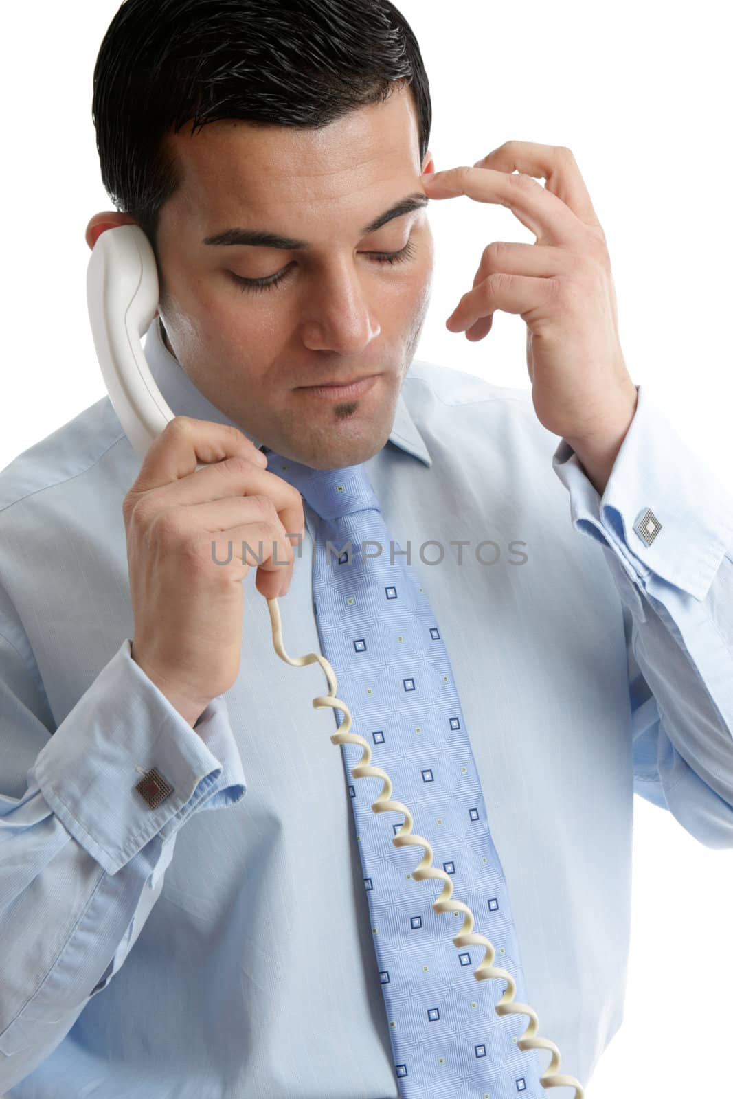 Troubled or depressed businessman making call by lovleah