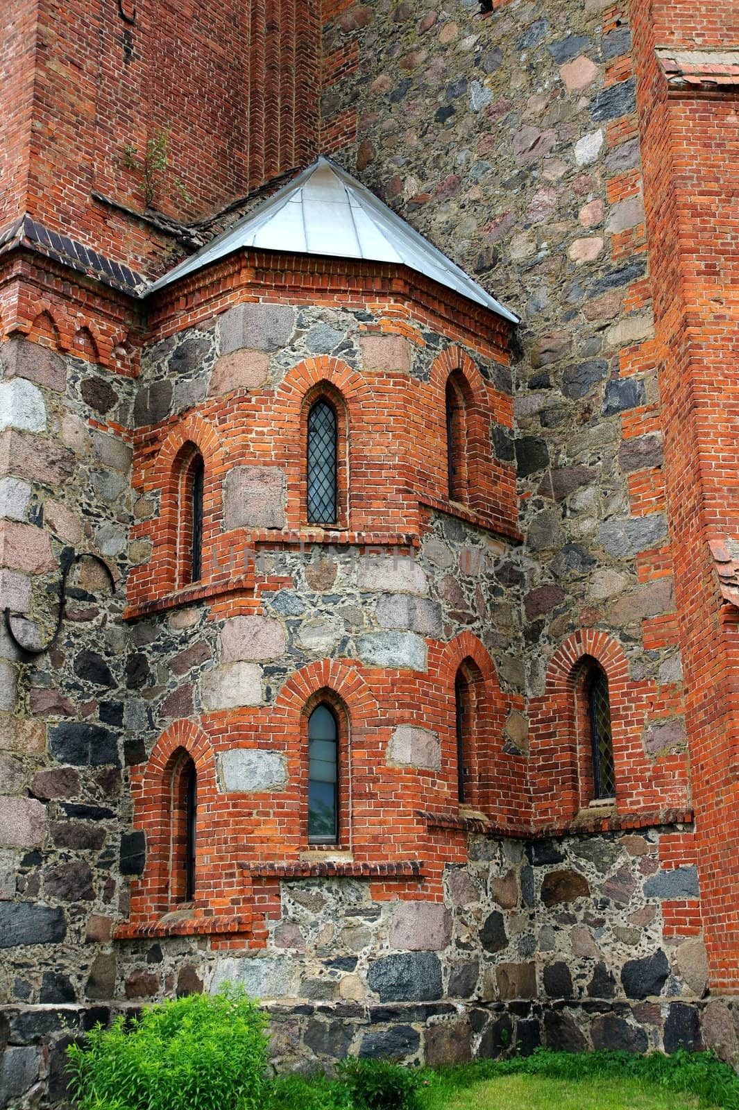 Internal spiral staircase of the old buildings of stone and brick  