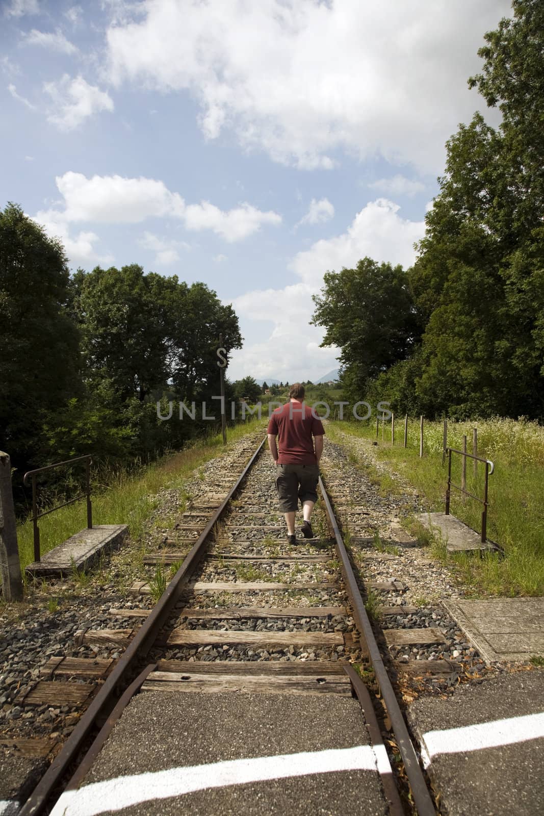 Man following tracks