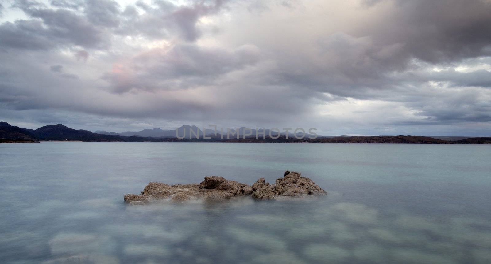 Beach on Gailoch peninsular over looking isle of skye