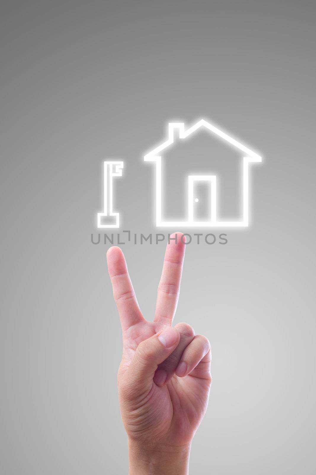 hand pointing to key and house icon by tungphoto