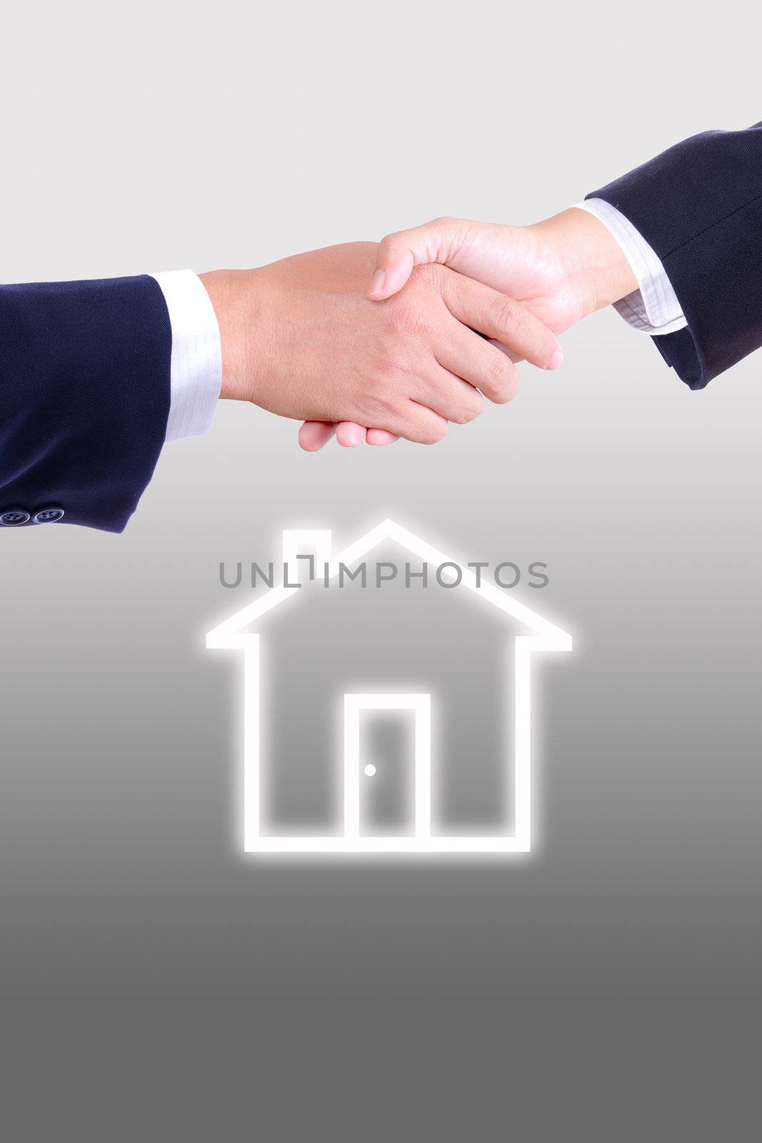 hand shaking and house icon by tungphoto