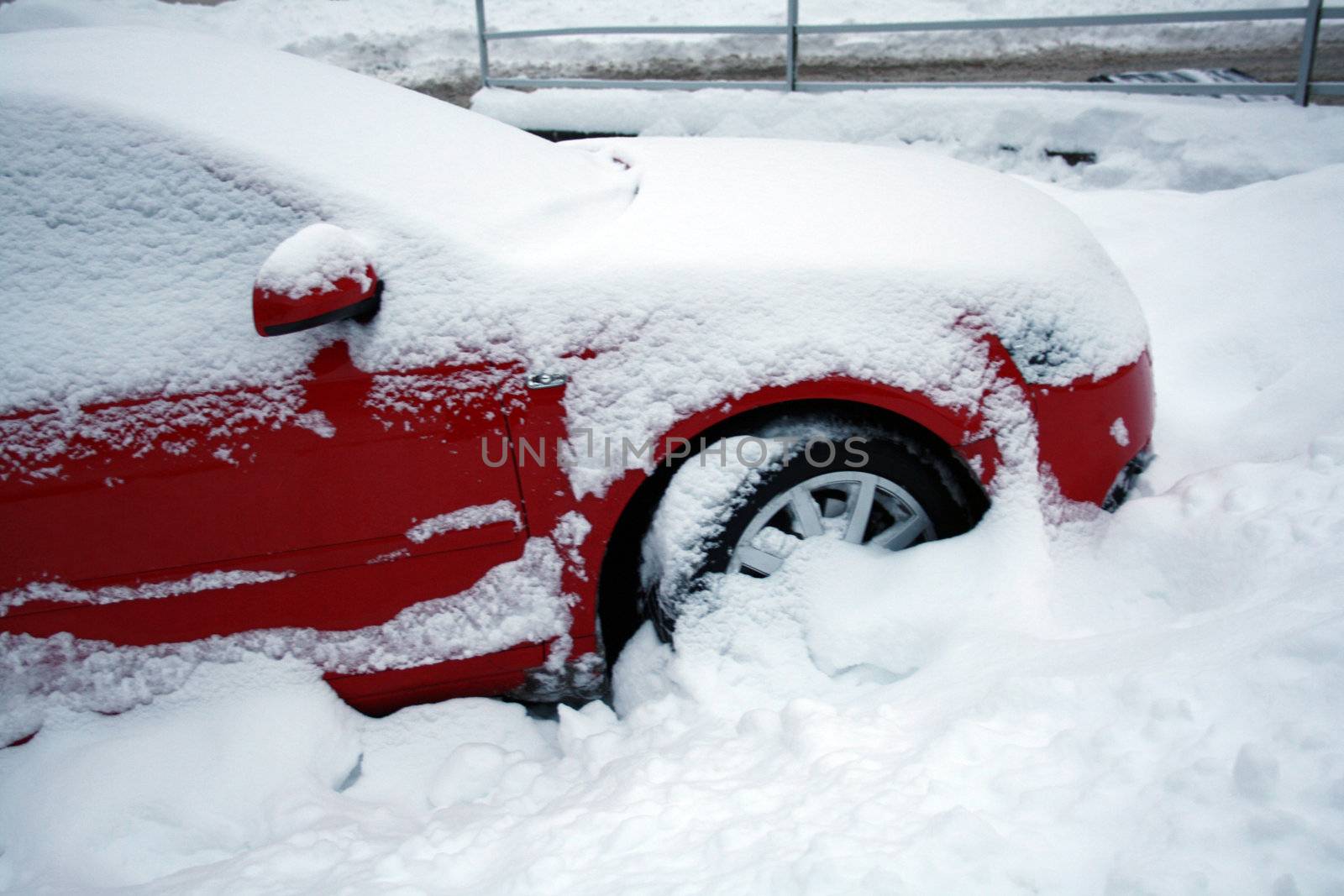  car covered with snow by photochecker