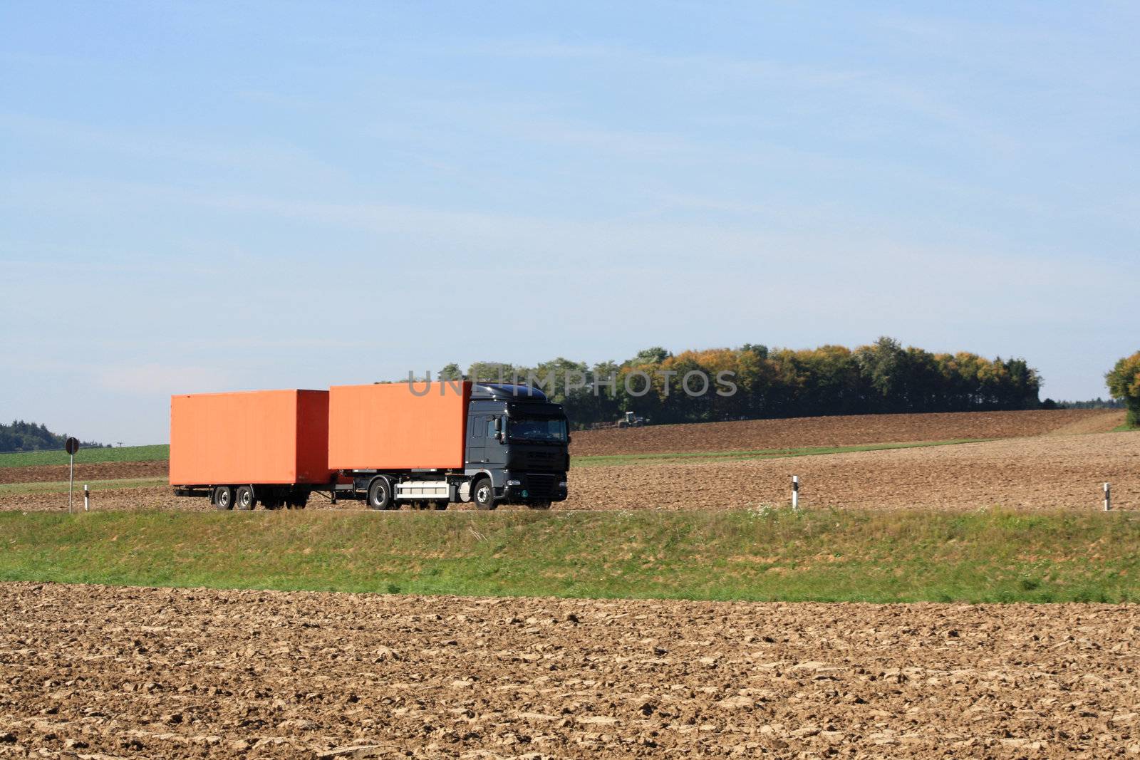 truck on the road by photochecker