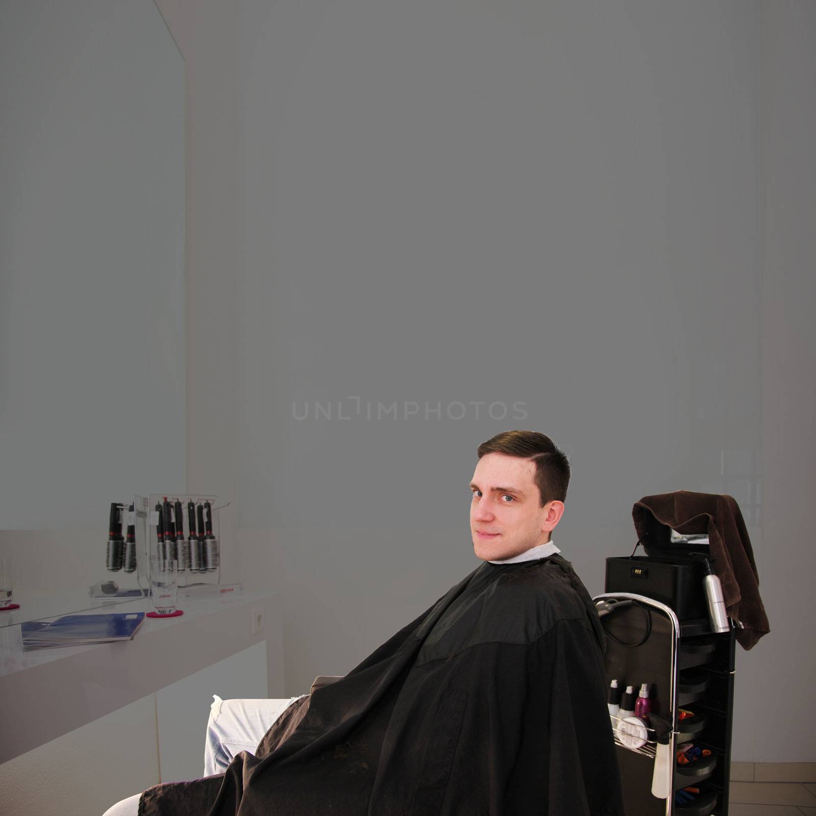 man in the barber salon by photochecker