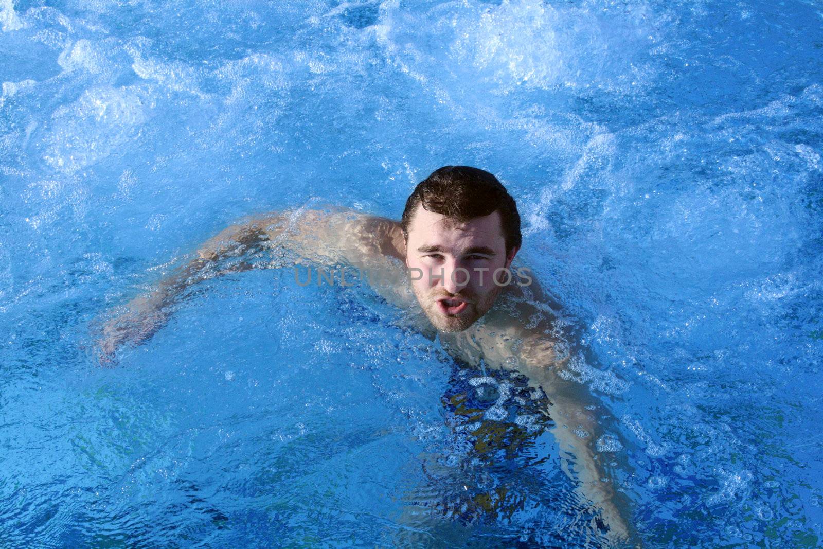 young attractive man relax in spa area