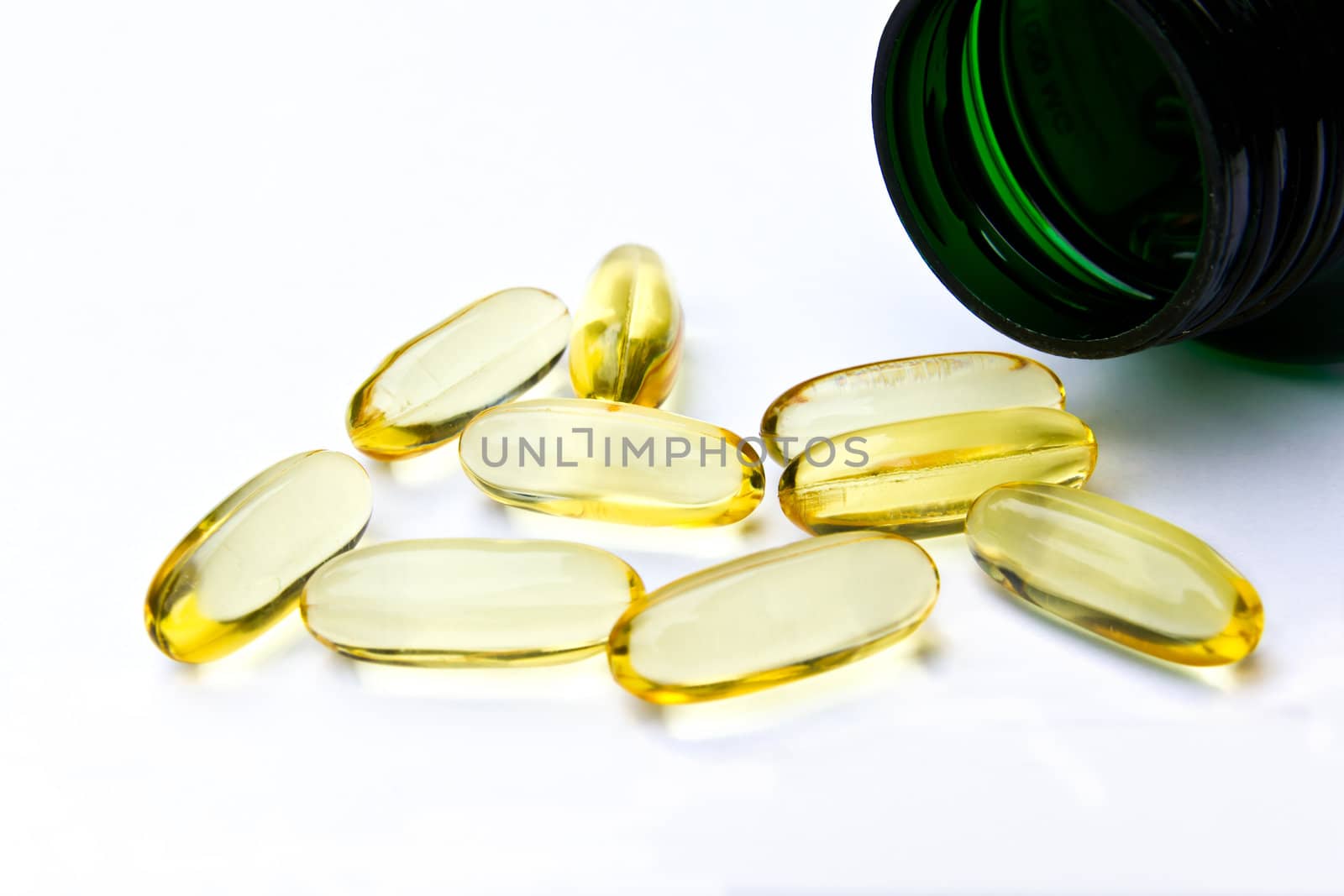 fish oil capsule by tungphoto