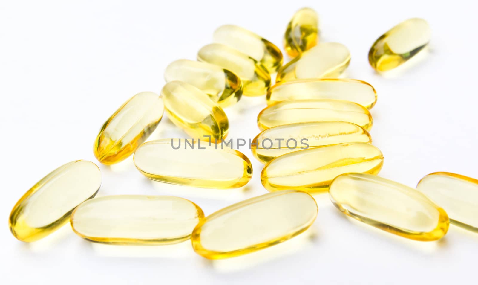 fish oil capsule by tungphoto