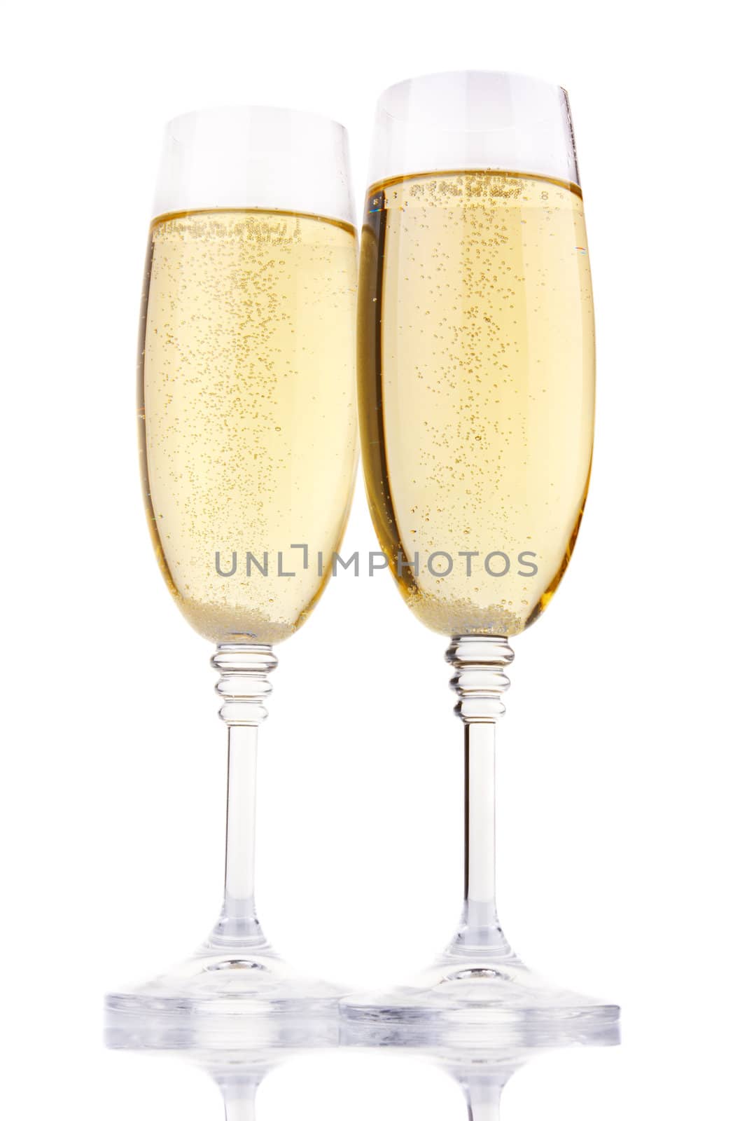 Two glasses of champagne isolated on white by alphacell