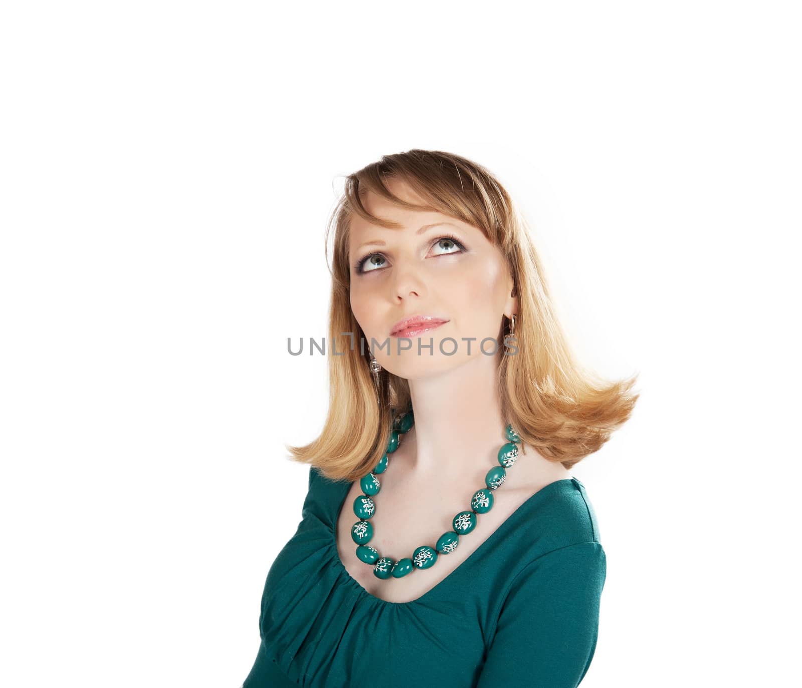 beauty portrait of a blonde in a green dress isolated on white background