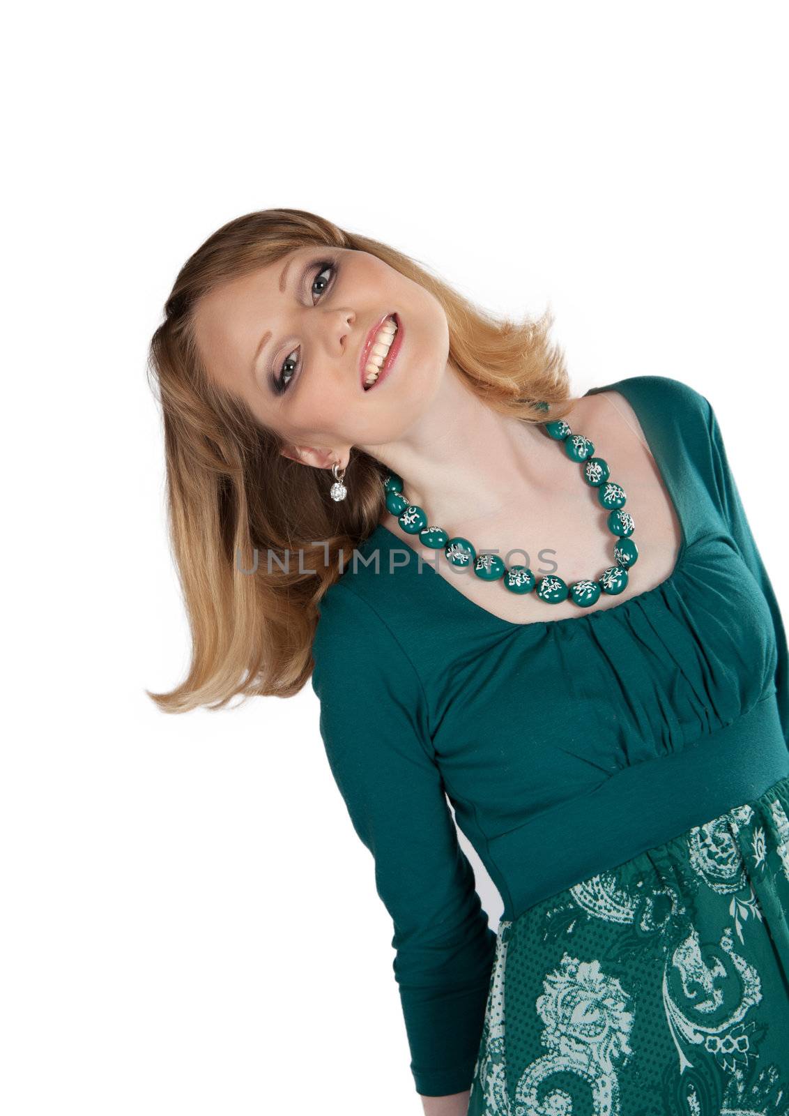 beauty portrait of a blonde in a green dress isolated on white background