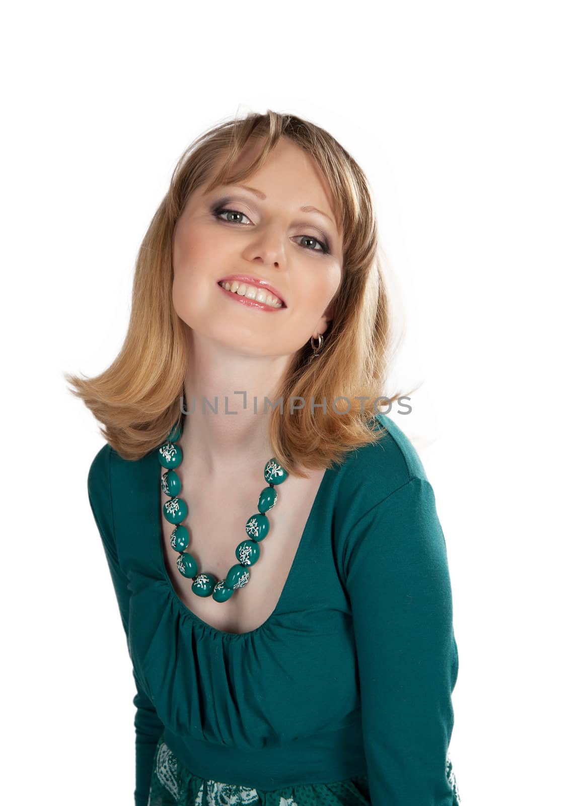 beauty portrait of a blonde in a green dress isolated on white background