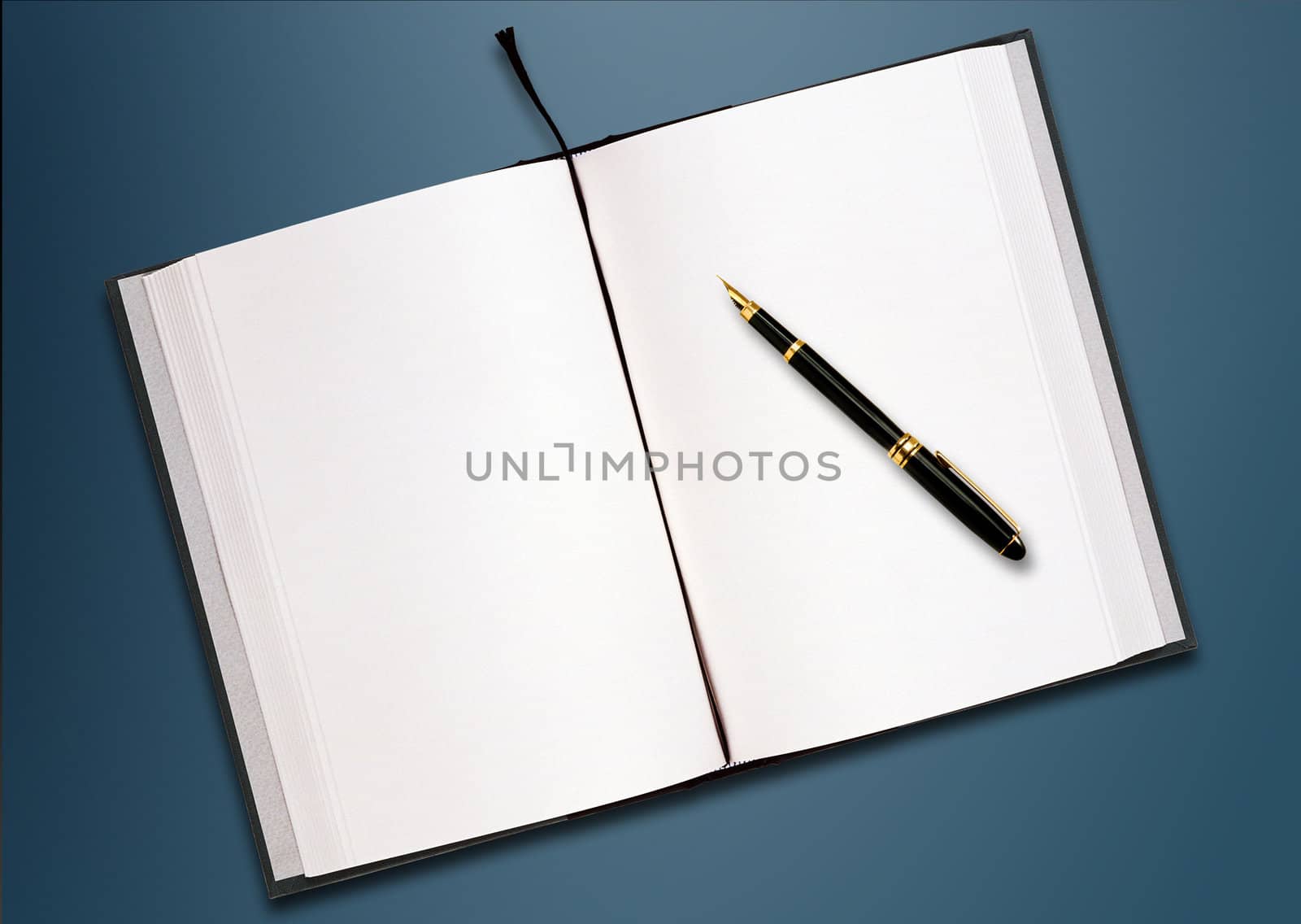 a pen and blank paper of open book on the table