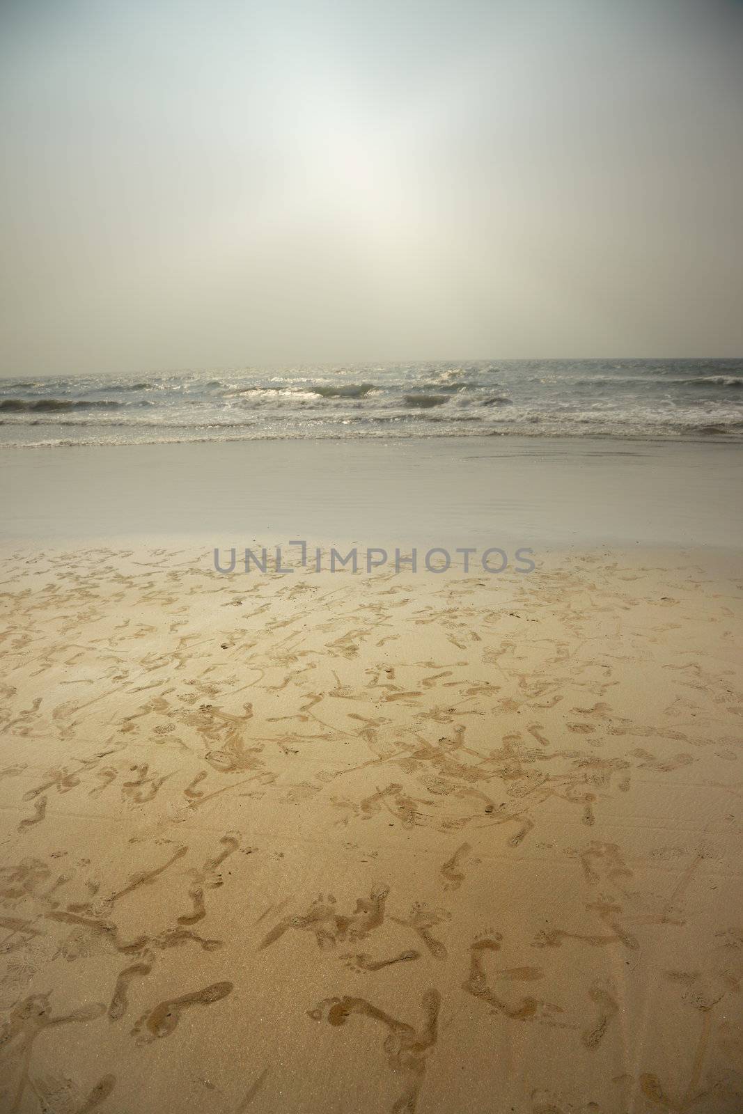 Footprints at the beach by Novic