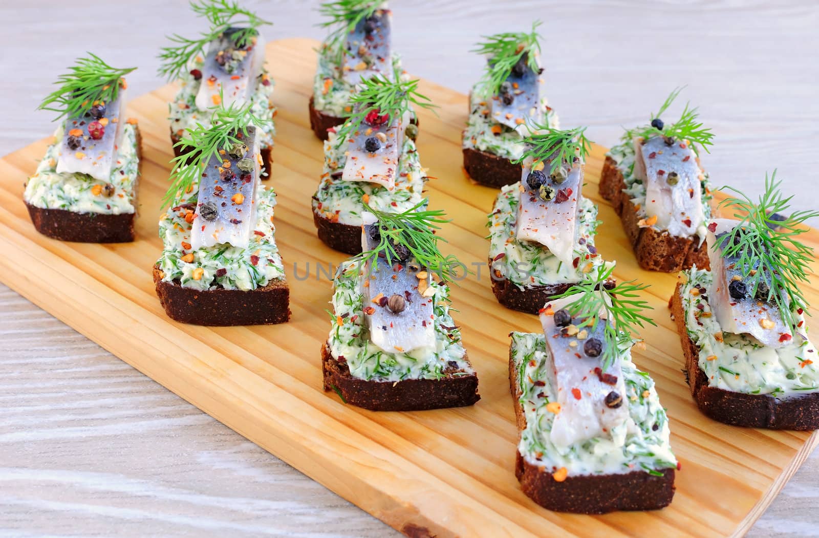 Snack rye bread and herring by Apolonia