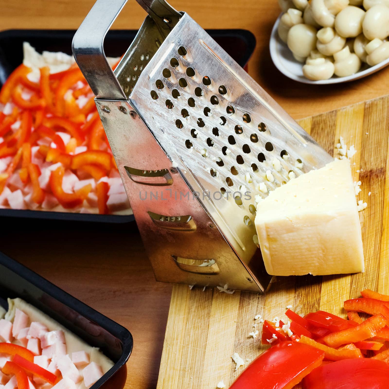 Stock photo: an image of food in the kitchen: cooking pizza