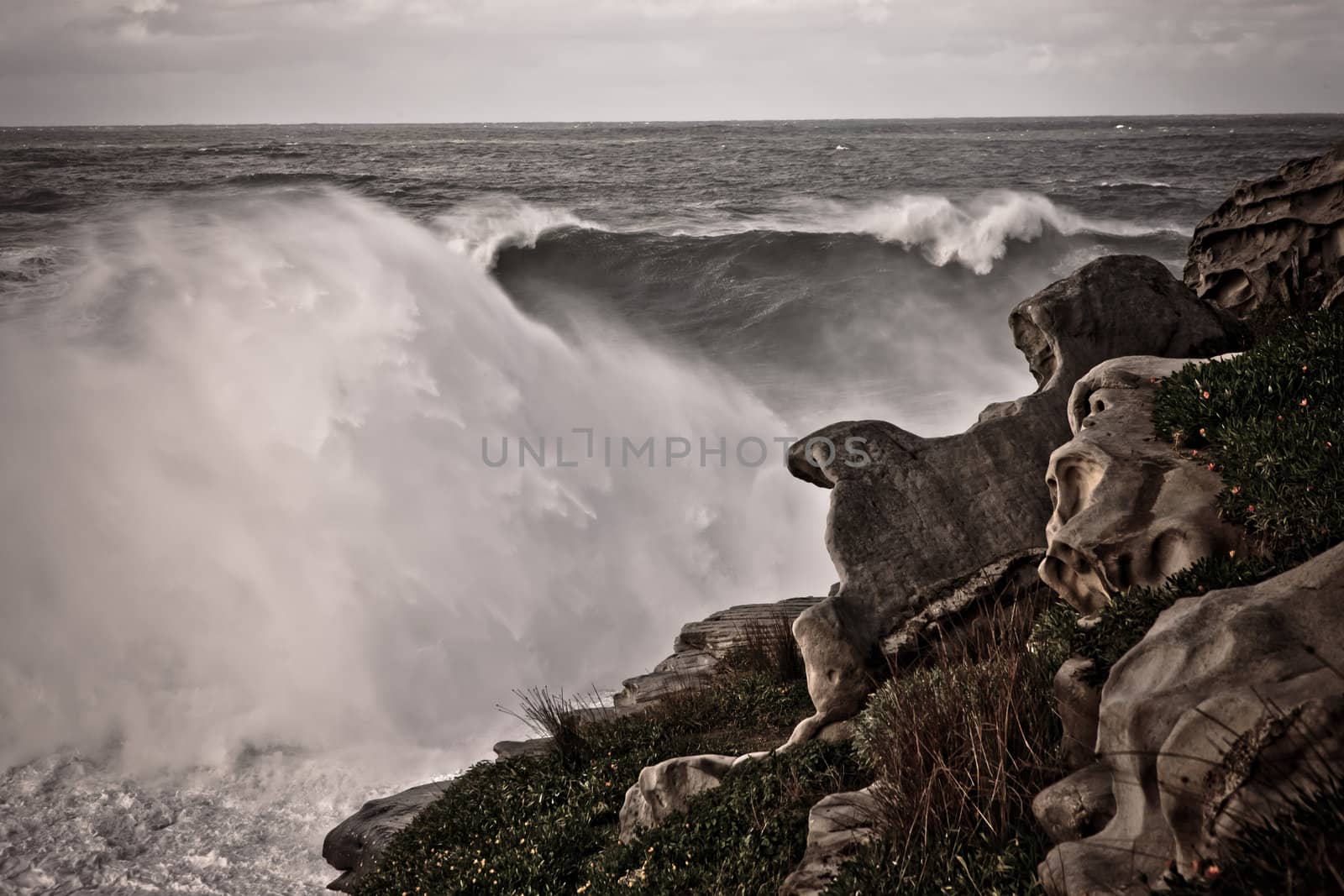 Stormy sea and breaking waves by jrstock