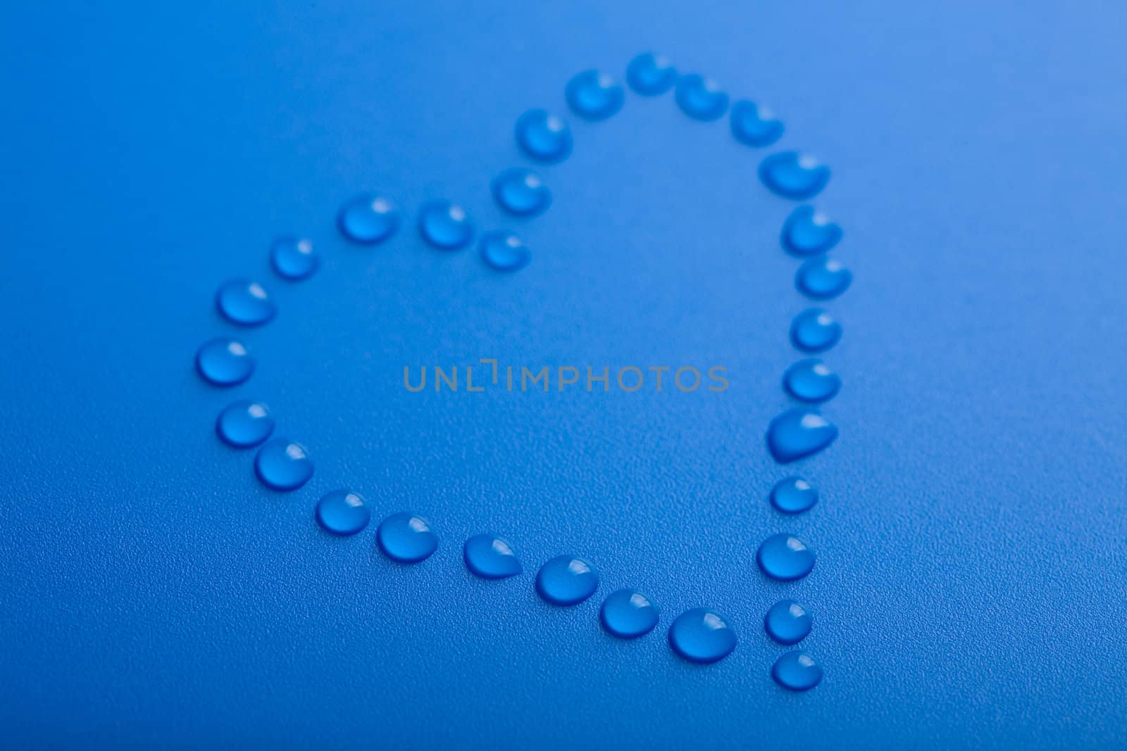 blue heart shape of water droplets
