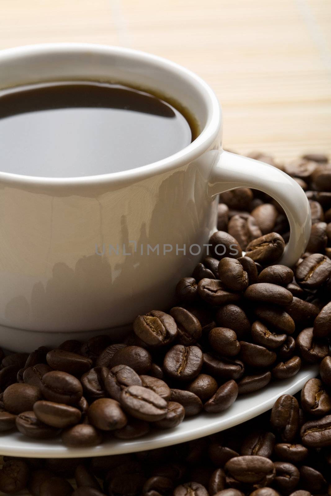 cup of coffee and coffee beans