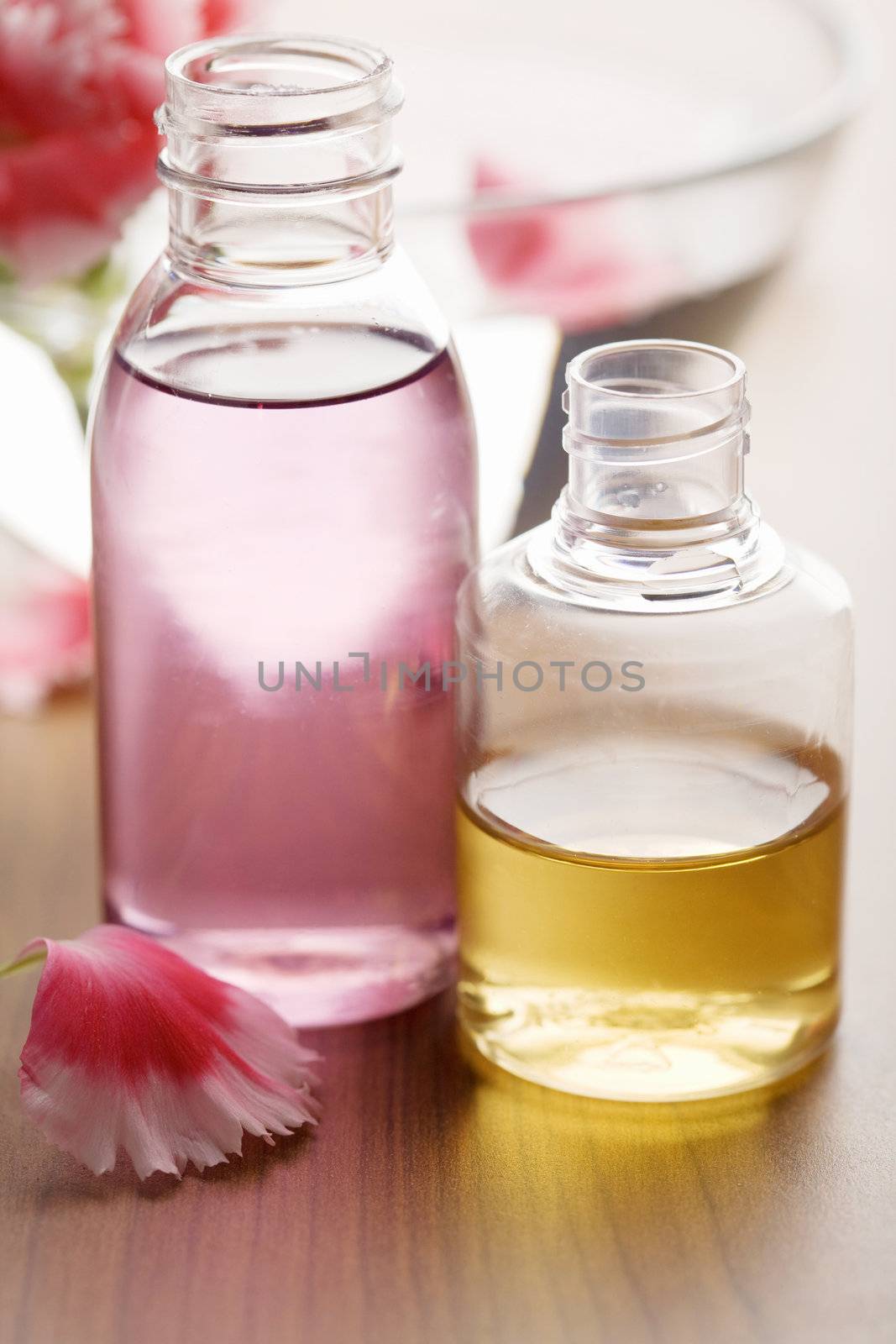essential oils in bottles. spa and body care background