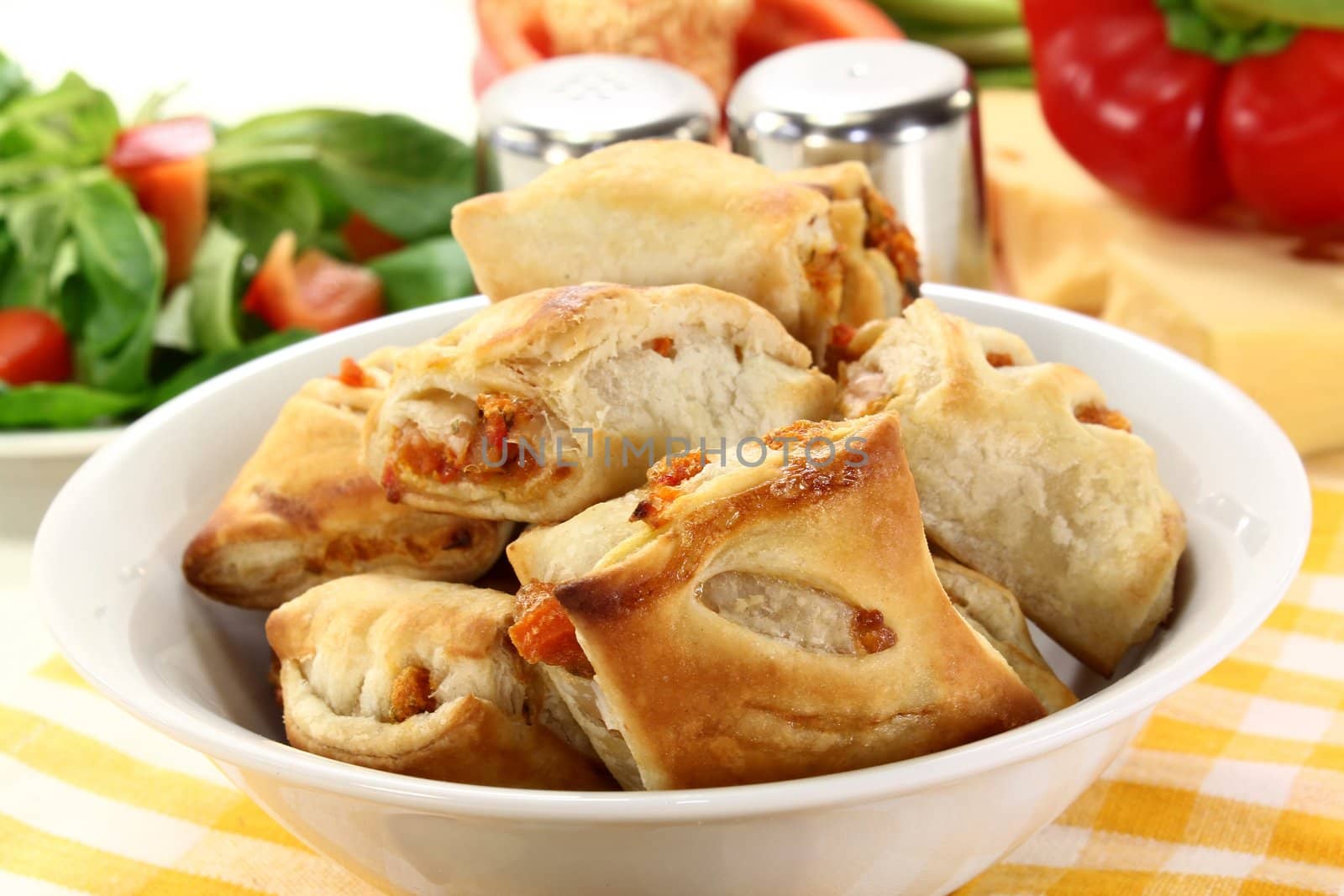 savory pastry snacks filled with red pepper and vegetables